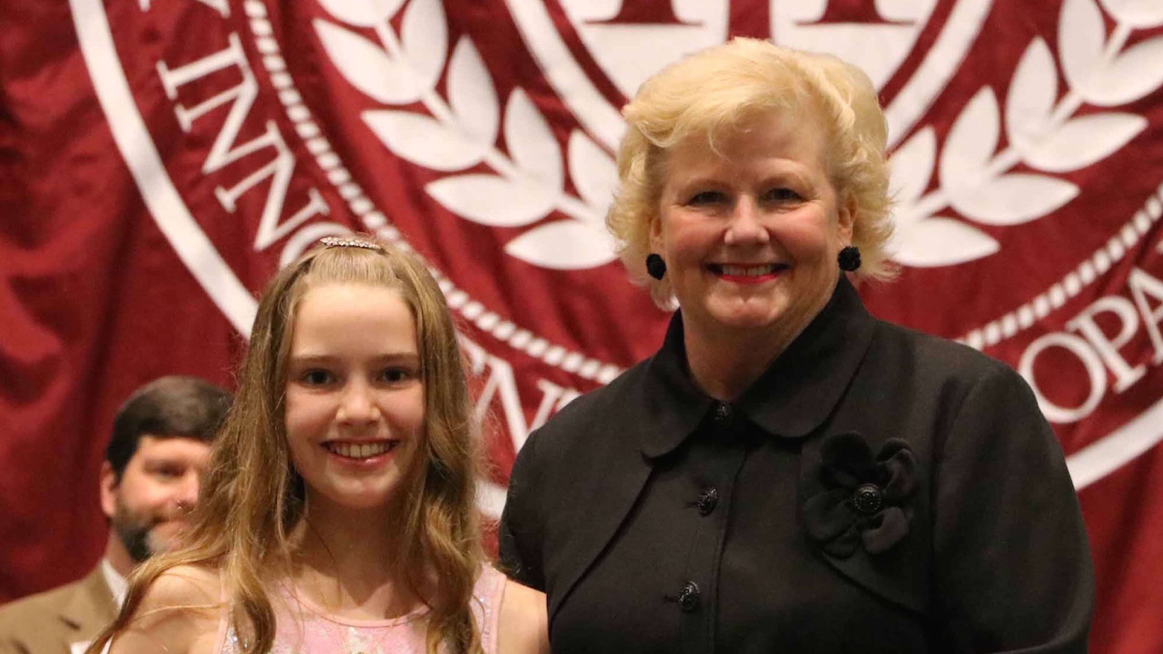 Anne Kallis of Holy Innocents’ Episcopal School (left) received the Alan A. Lewis Award from Principal Terri Potter (right) for exhibiting high standards of academic achievement, citizenship, and leadership.