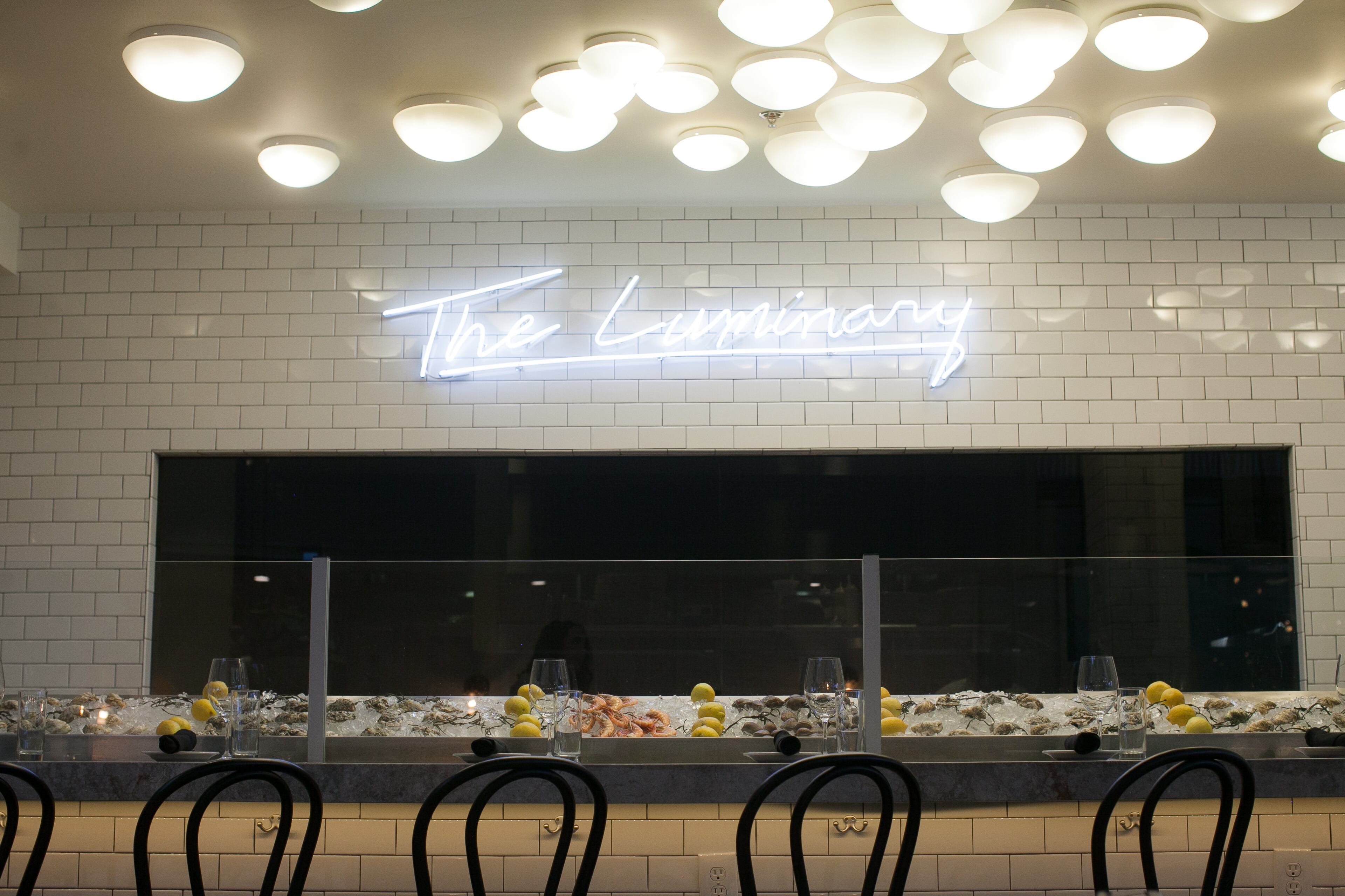 A raw bar was incorporated into the restaurant's design along with traditional brasserie touches like white subway tile and brass. Credit: Renee Brock