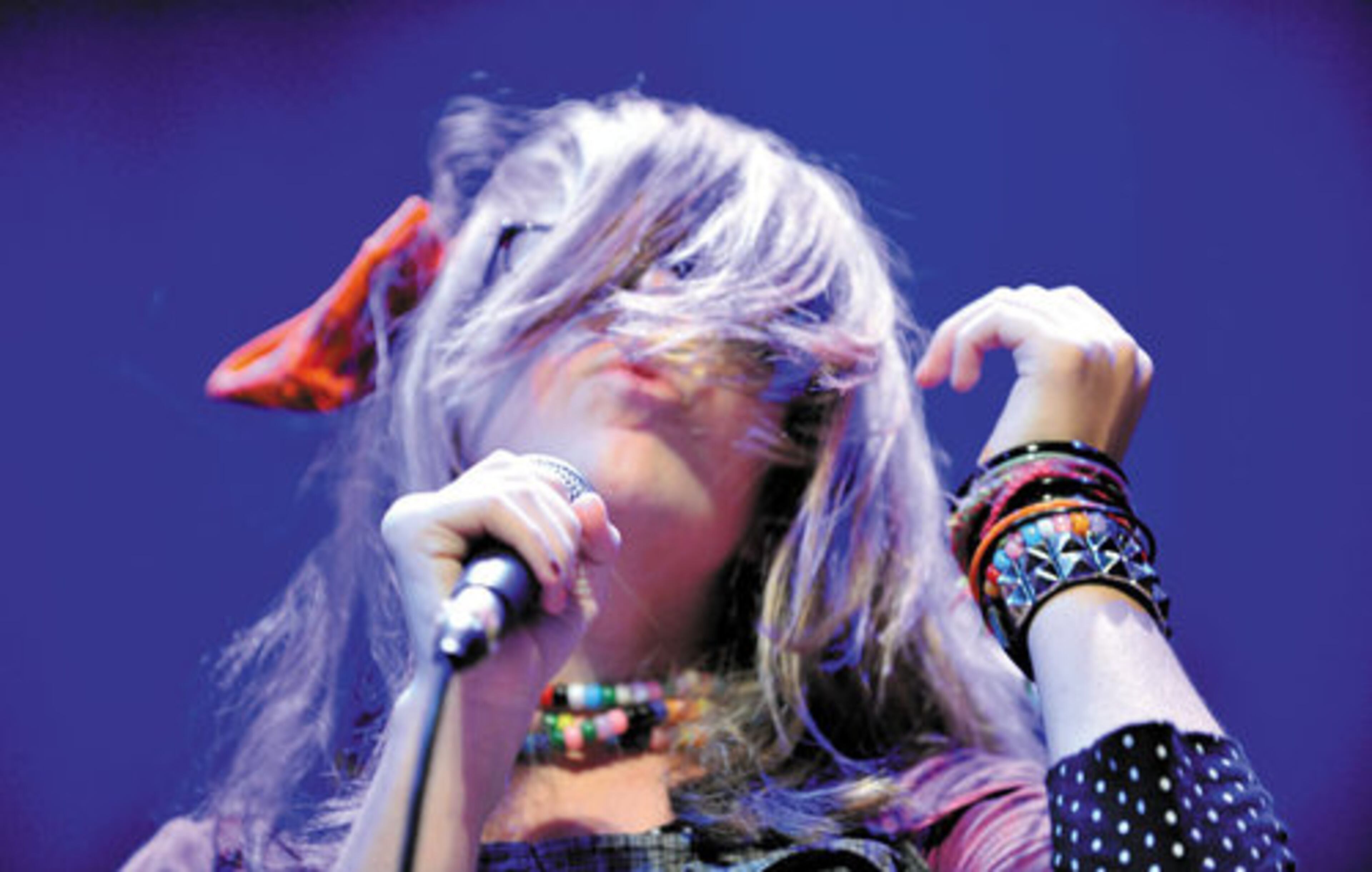 Davis Crenshaw, singer for Drop Dead Diamondz, performs.