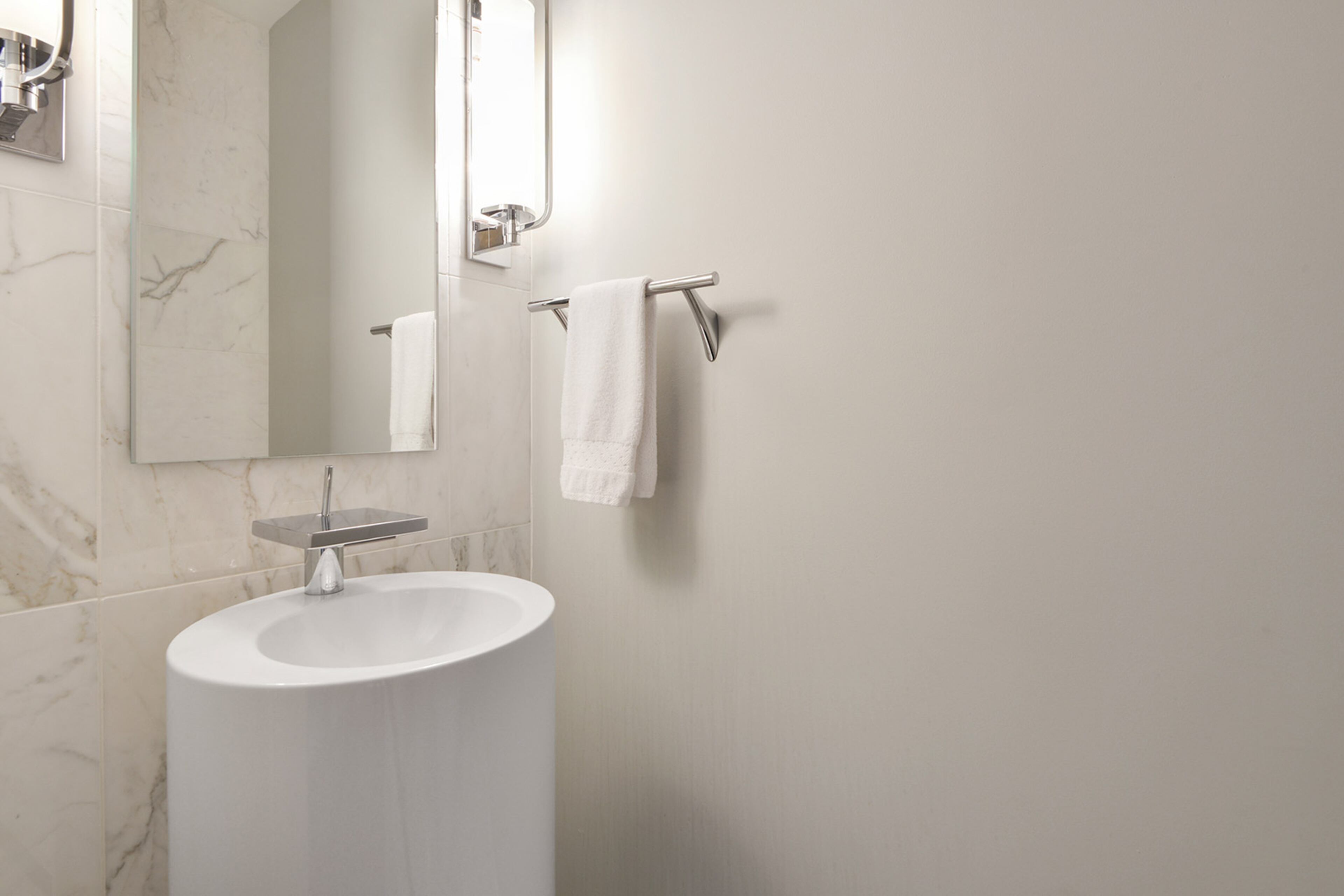 Modern fixtures are offered in the bathroom.