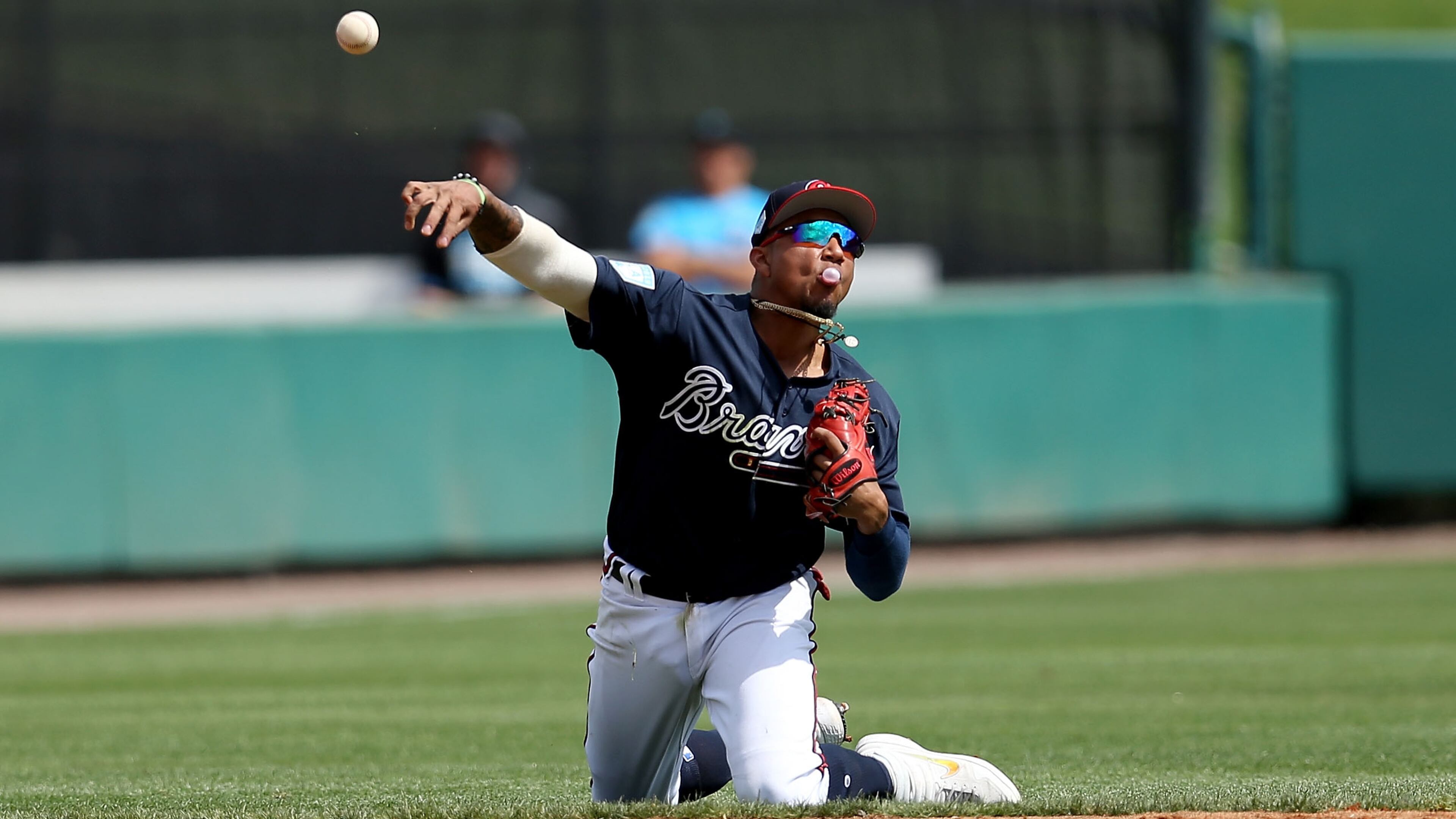 Braves' Johan Camargo throws to first base in the second inning Sunday, March 3, 2019, against the Miami Marlins at Champion Stadium in Lake Buena Vista, Fla.