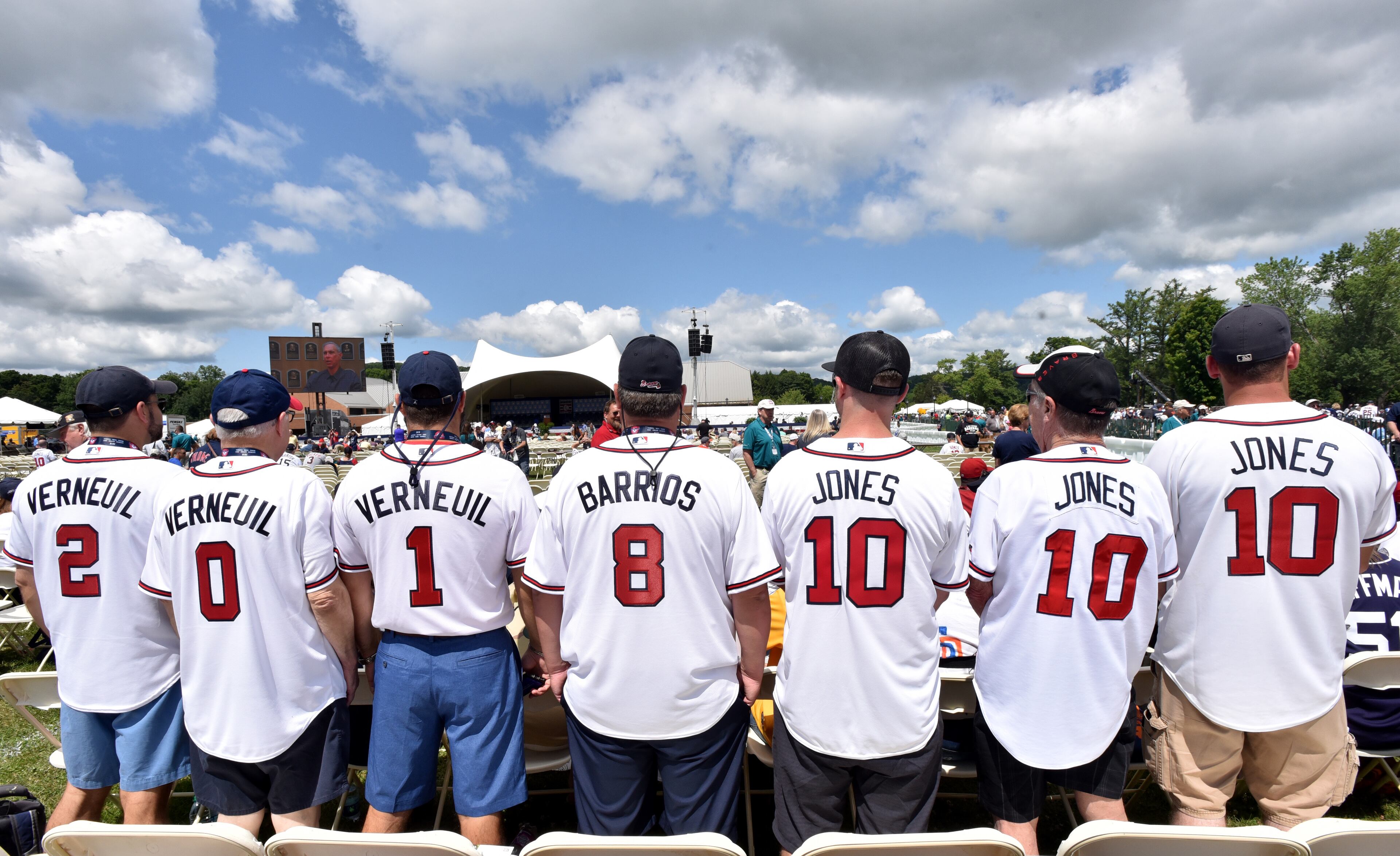 HALL OF FAME ATTENDEES: Cooperstown, N.Y. - Braves legend Chipper Jones' fans coincidently sit in same row to make a perfect contribution for the legend before the 2018 National Baseball Hall of Fame Induction Ceremony at the Clark Sports Center in Cooperstown, N.Y. on Sunday, July 29, 2018. Braves legend Chipper Jones is set for induction into the National Baseball Hall of Fame on Sunday in Cooperstown, N.Y. HYOSUB SHIN / HSHIN@AJC.COM