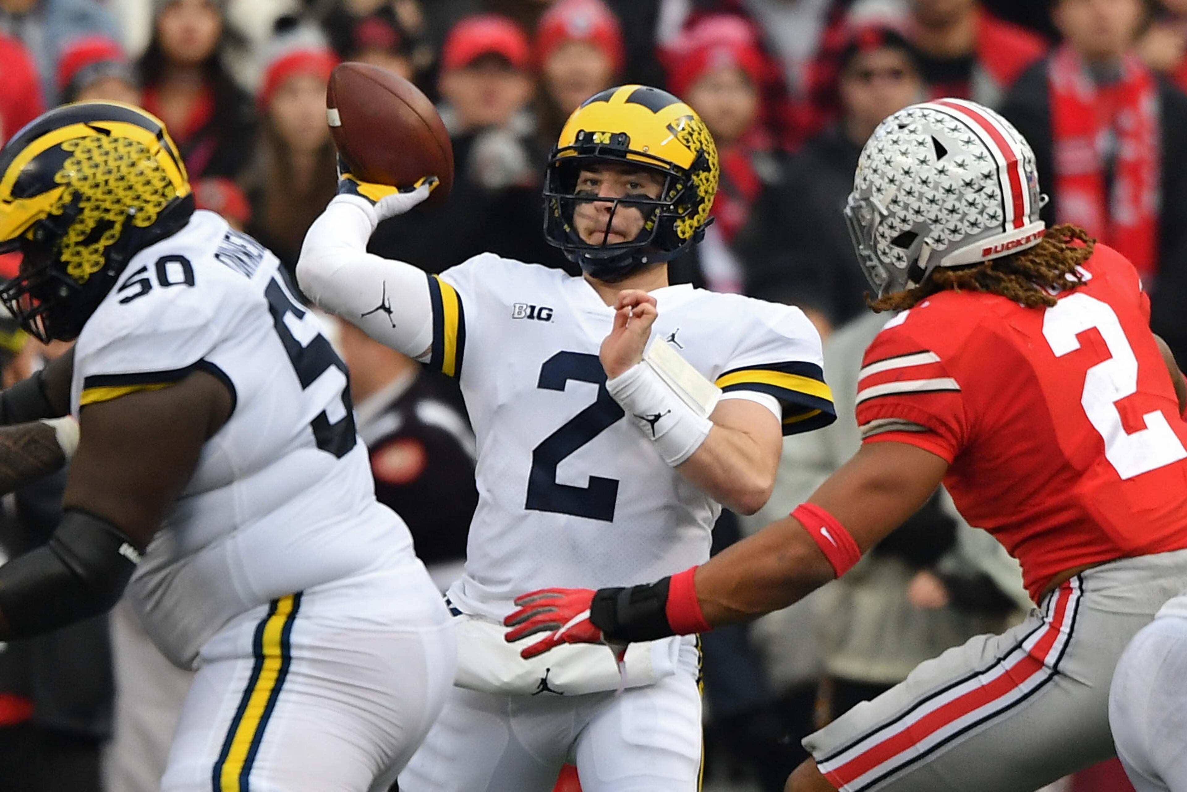 Michigan quarterback Shea Patterson throws a pass in the third quarter against the Ohio State Buckeyes Nov. 24, 2018, at Ohio Stadium in Columbus, Ohio.