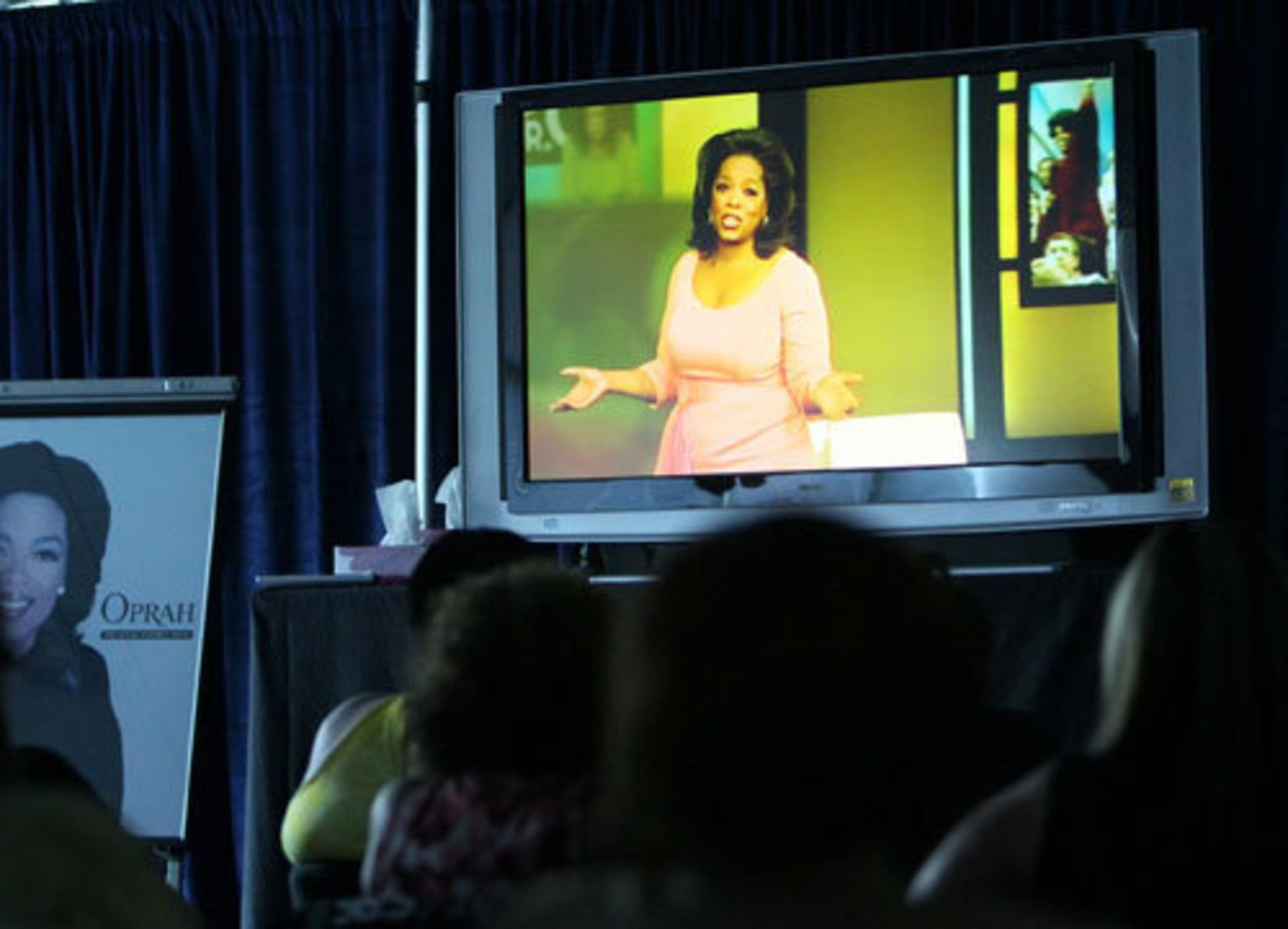 Fans watch Oprah's final show.