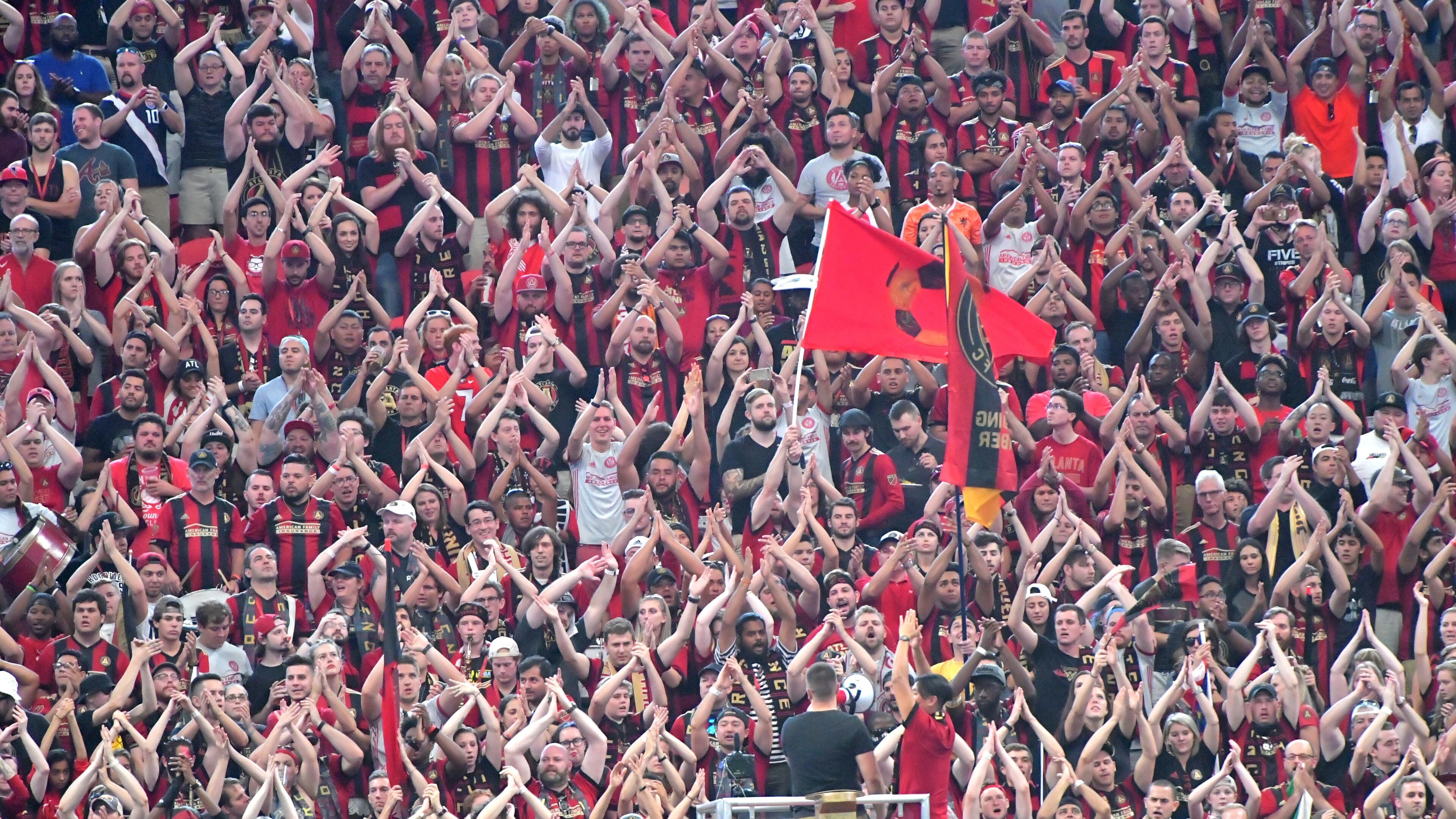 September 16, 2017 Atlanta - Atlanta United fans cheer in the first half of an MLS soccer match at the Mercedes-Benz Stadium on Saturday, September 16, 2017. HYOSUB SHIN / HSHIN@AJC.COM
