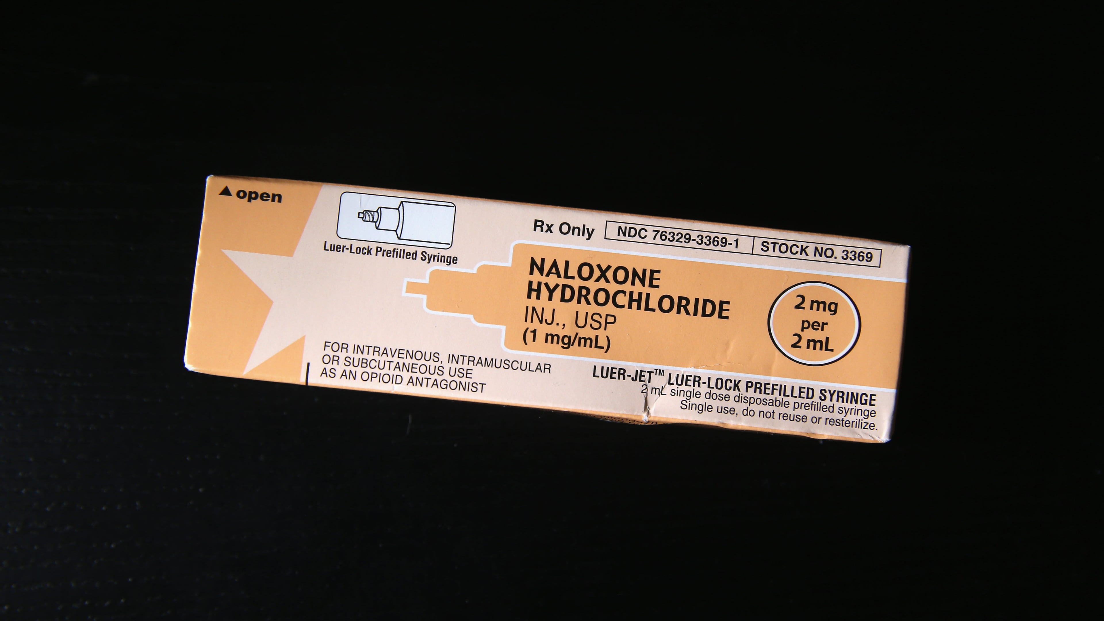 A box of the opioid antidote Naloxone, also known as Narcan, sits on display during a family addiction support group on March 23, 2016 in Groton, CT. The drug is used to revive people suffering from heroin overdose.