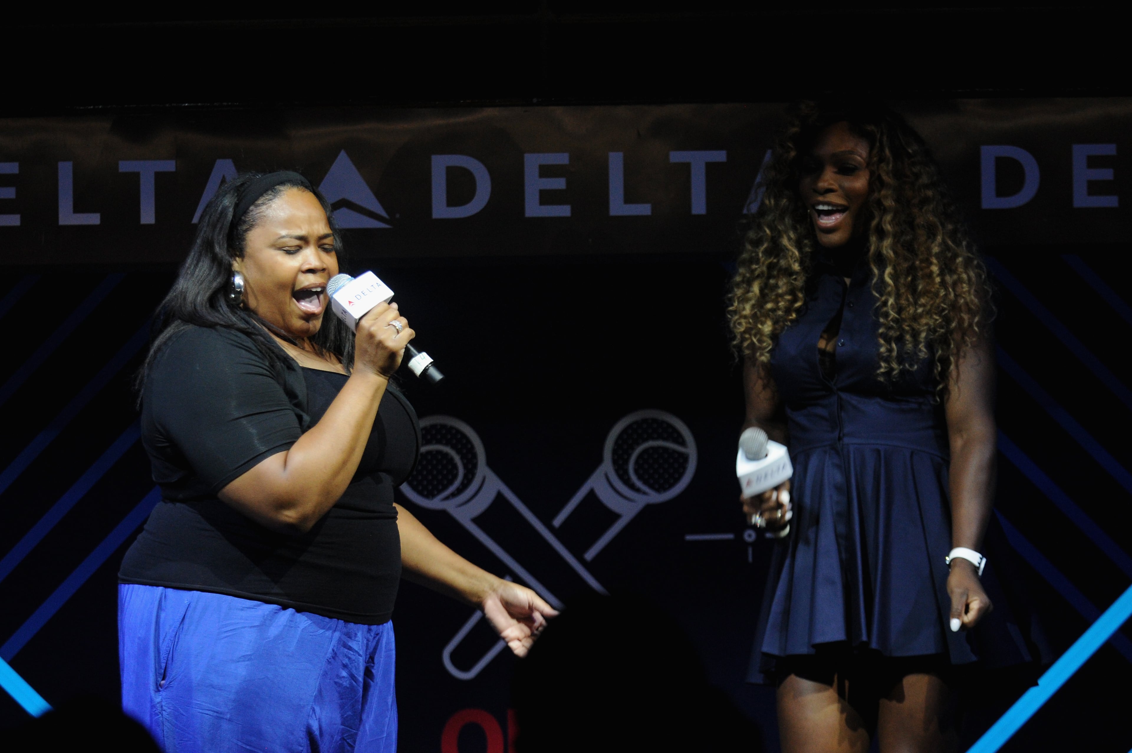 NEW YORK, NY - AUGUST 20: Isha Price and Serena Williams join Delta Air Lines for the Delta OPEN Mic, a private karaoke event in celebration of her upcoming defending tennis championship and magazine cover profile with celebrity guests and friends at Arena, on August 20, 2014 in New York City. (Photo by Bryan Bedder/Getty Images for Delta)