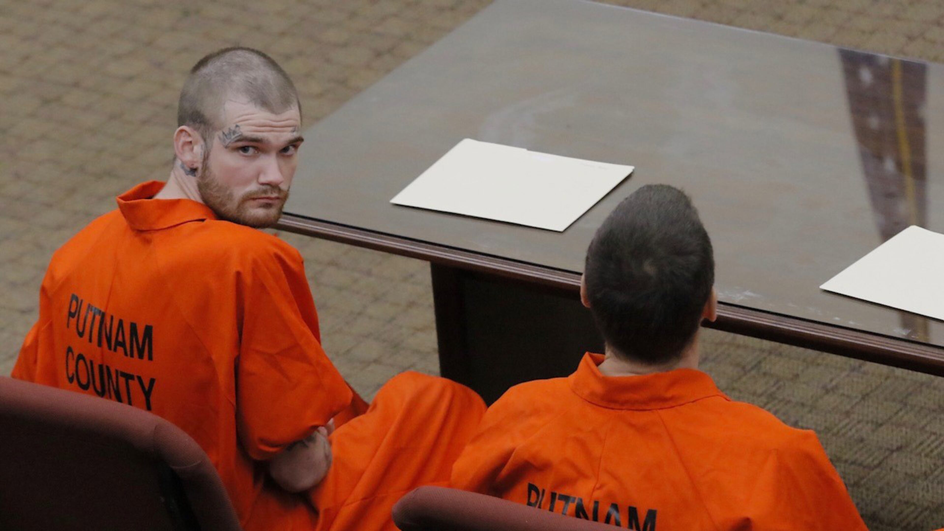 Ricky Dubose (left) and Donnie Russsell Rowe sit before a judge in the Putnam County courthouse in Eatonton on Wednesday, June 21, 2017. The pair is accused of killing two correctional officers while escaping from a prison transport bus. A state prosecutor said Wednesday that he will seek the death penalty against them. They were denied bond. (BOB ANDRES/AJC)