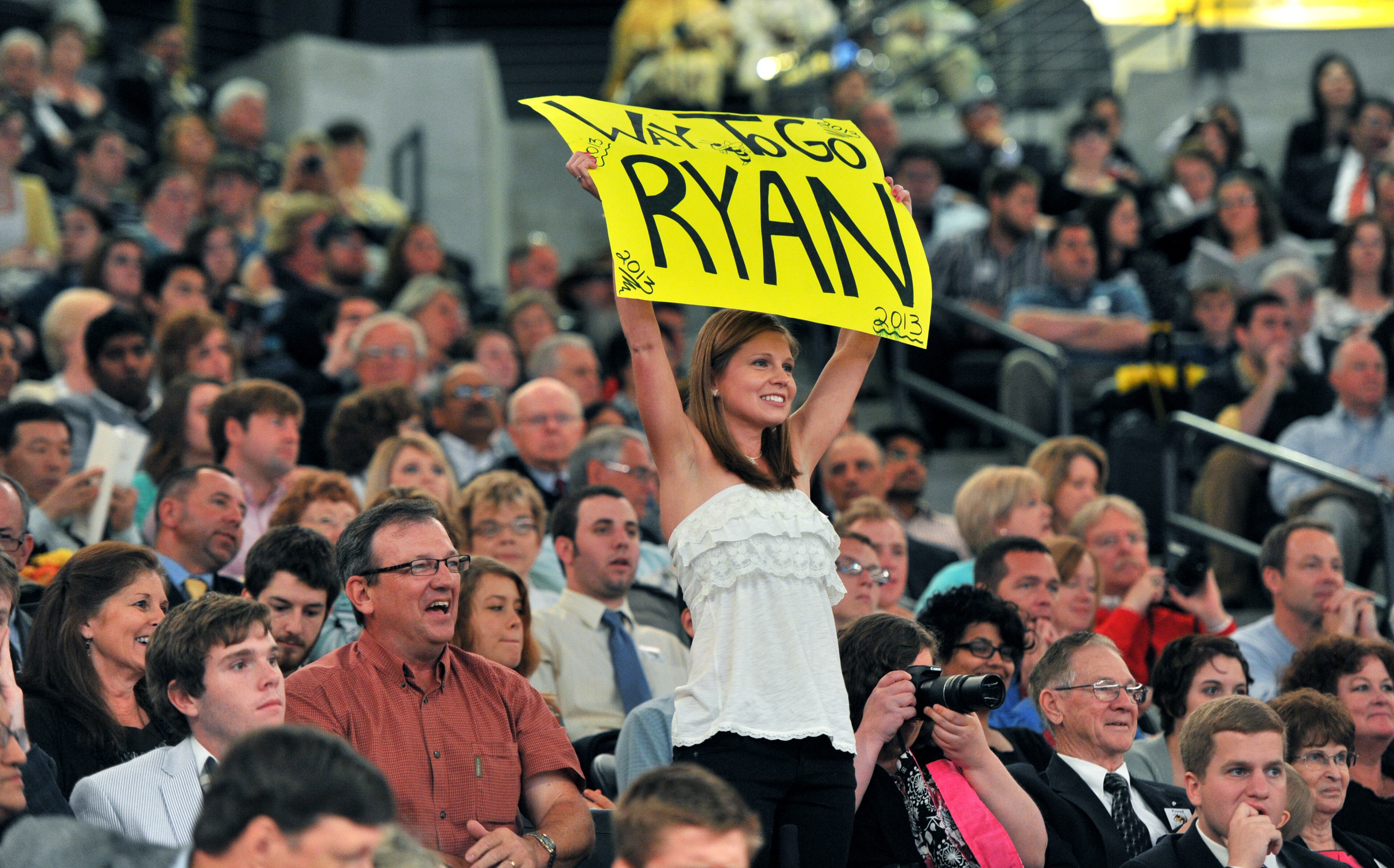 Family members and friends cheer during the Bachelor's Ceremony during Spring 2013 Commencement at Georgia Tech's McCamish Pavilion on Saturday, May 4, 2013. HYOSUB SHIN / HSHIN@AJC.COM