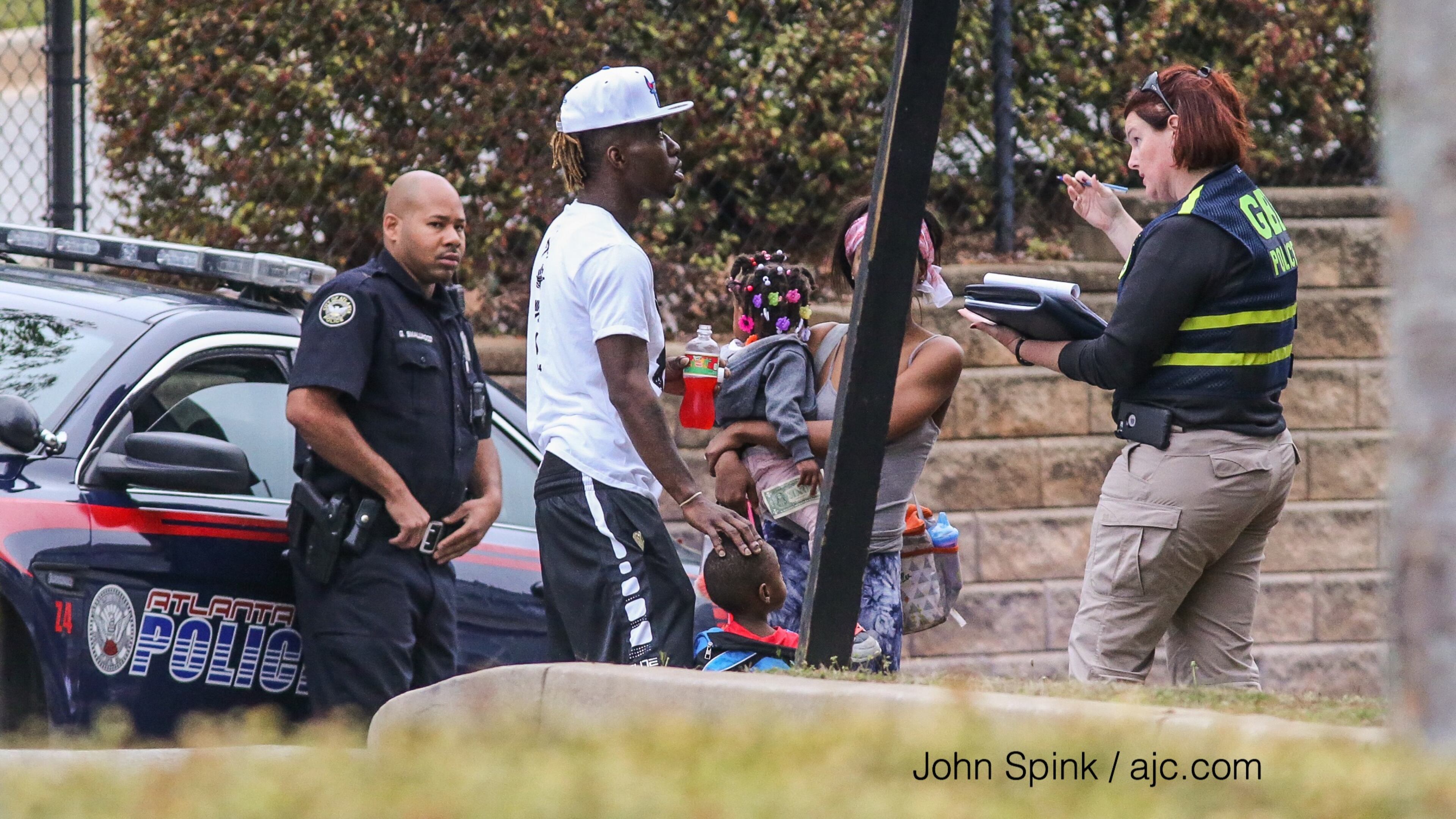 Authorities are investigating an officer-involved shooting Monday in southwest Atlanta. JOHN SPINK / JSPINK@AJC.COM