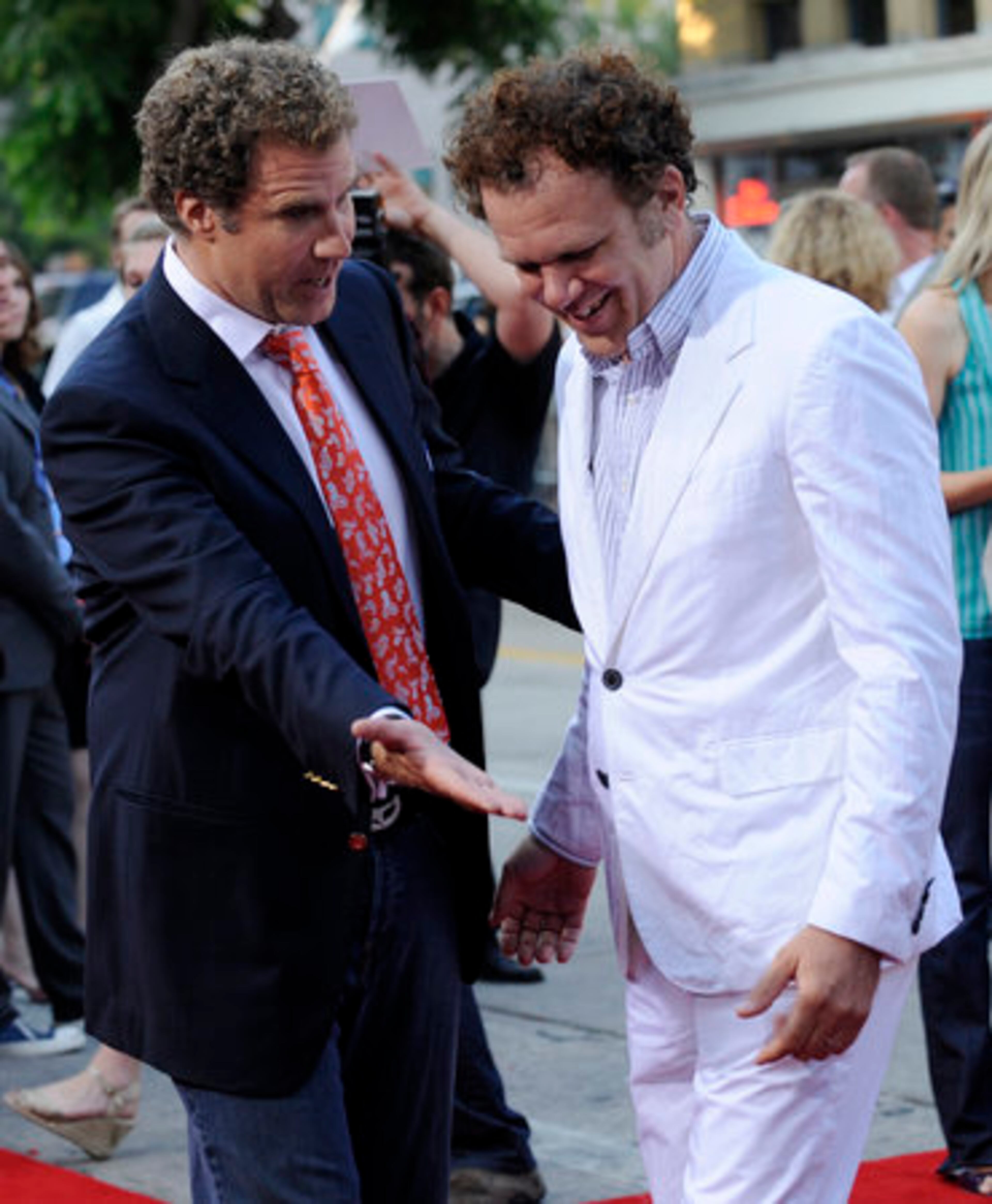 Will Ferrell shows his John C. Reilly his polite side, letting him walk ahead. But knowing Ferrell, he probably had a "kick me" sign to stick to his co-star's back.