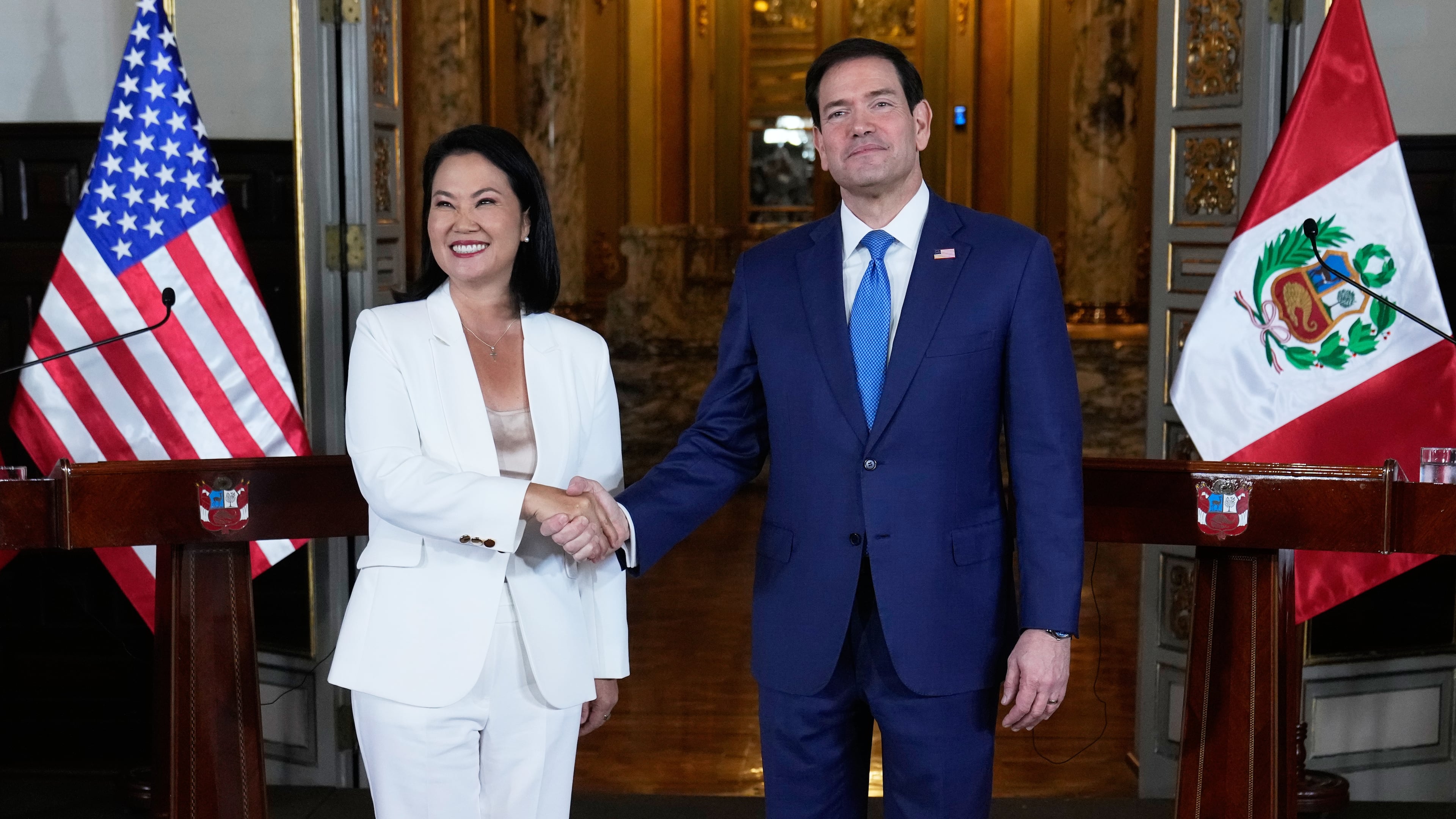 U.S. Secretary of State Marco Rubio, right, and Peruvian President Keiko Fujimori shake hands after a joint news conference at the presidential palace in Lima, Peru, Thursday, Sept. 10, 2026. (AP Photo/Martin Mejia, Pool)