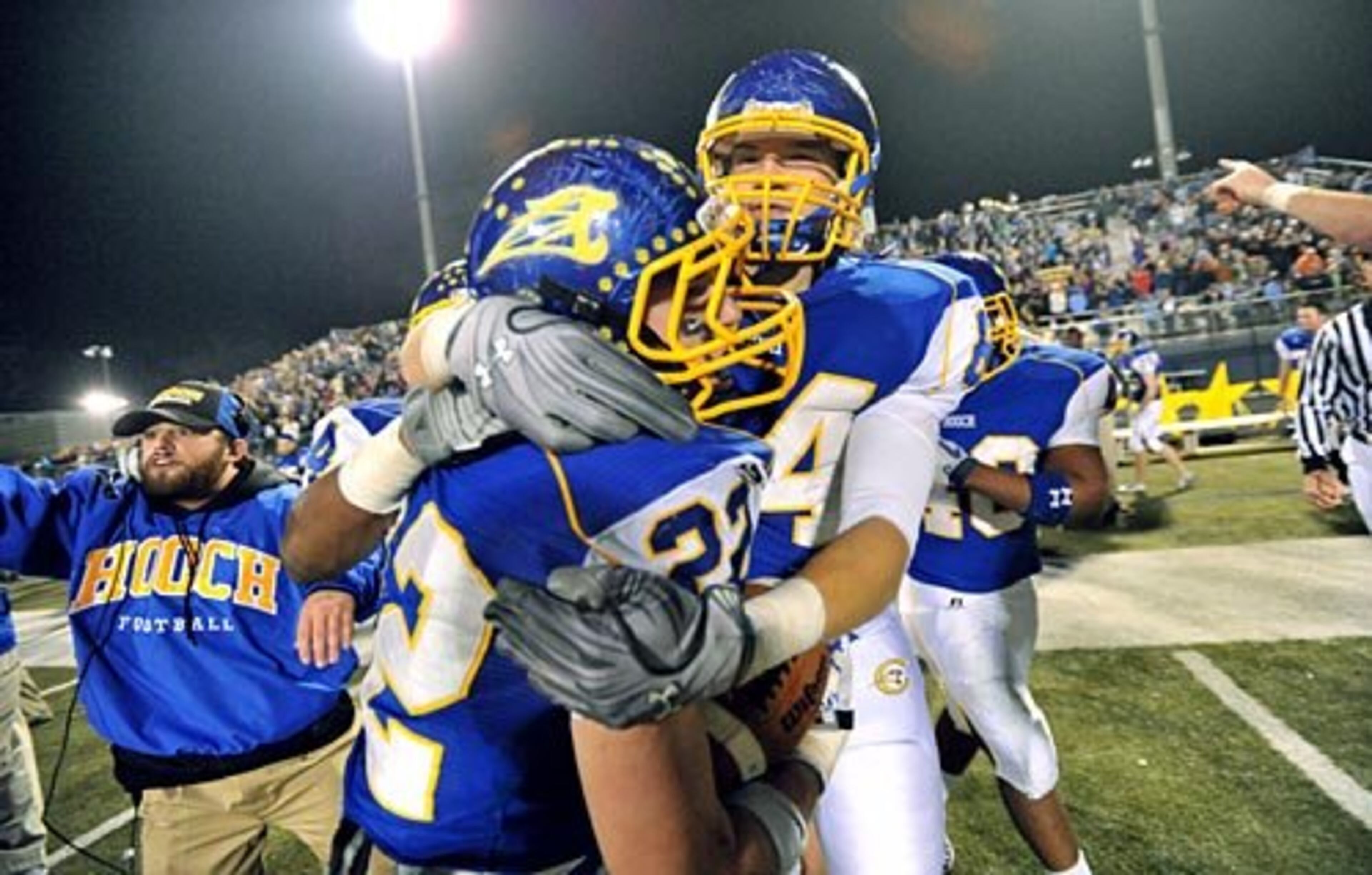 Chattahoochee Josh Gregory (22) celebrates with teammate Kyle Johnston after his interception at the end of the fourth quarter against Marist.