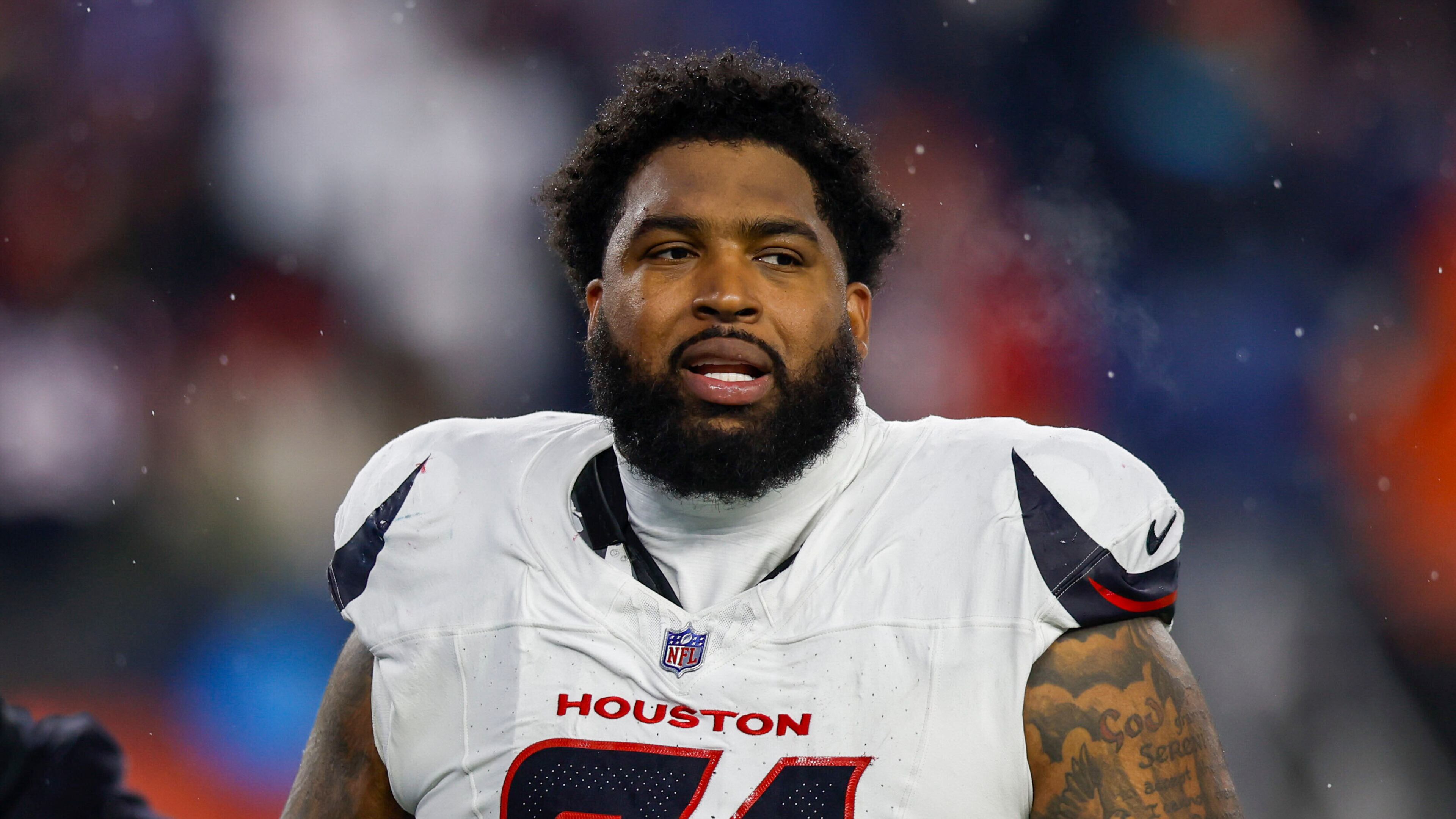 Houston Texans offensive tackle Tytus Howard (71) reacts during the first half of an NFL divisional playoff football game against the New England Patriots, Sunday, Jan. 18, 2026, in Foxborough, Mass. (AP Photo/Greg M. Cooper)