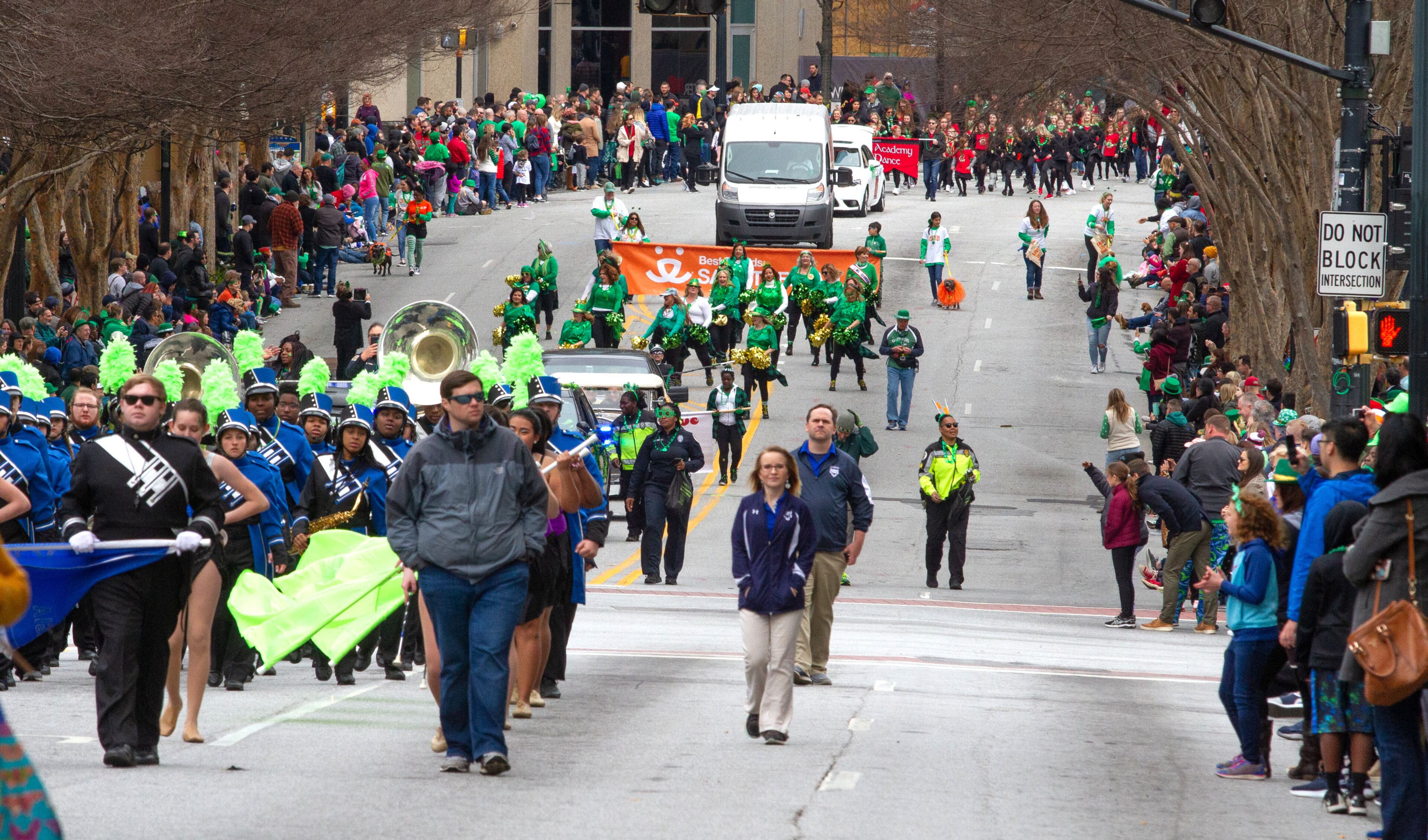 A large crowd lines Peachtree Street on Saturday during the Atlanta St. Patrick's Parade, March 16, 2019. (Photo: STEVE SCHAEFER / SPECIAL TO THE AJC)