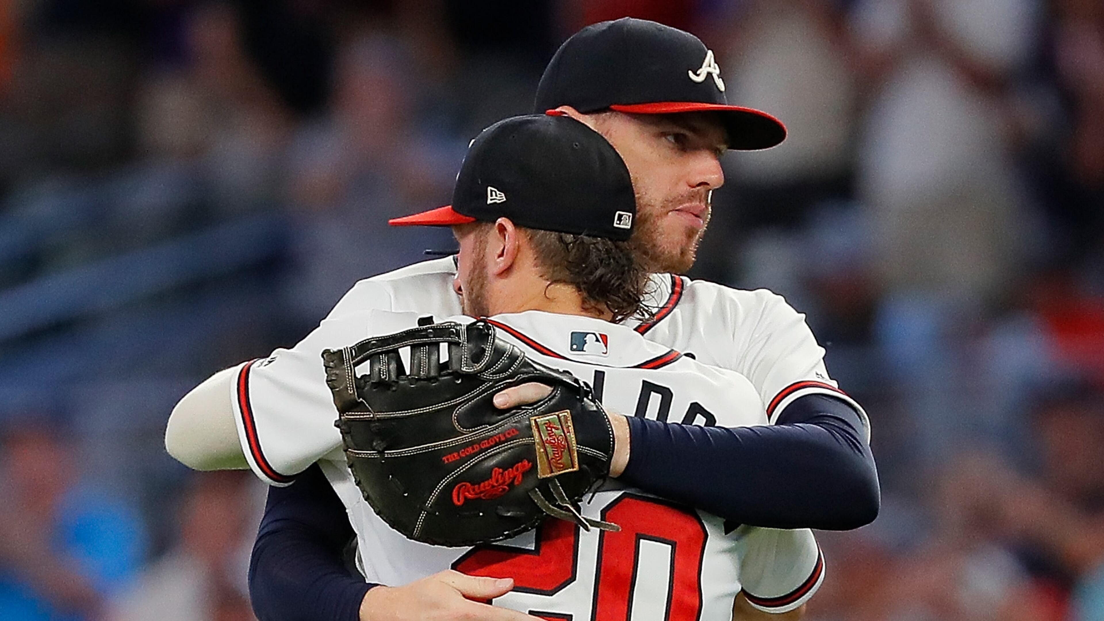 The Braves’ Josh Donaldson (20) and Freddie Freeman celebrate their 4-2 win over the Washington Nationals at SunTrust Park on Thursday night.