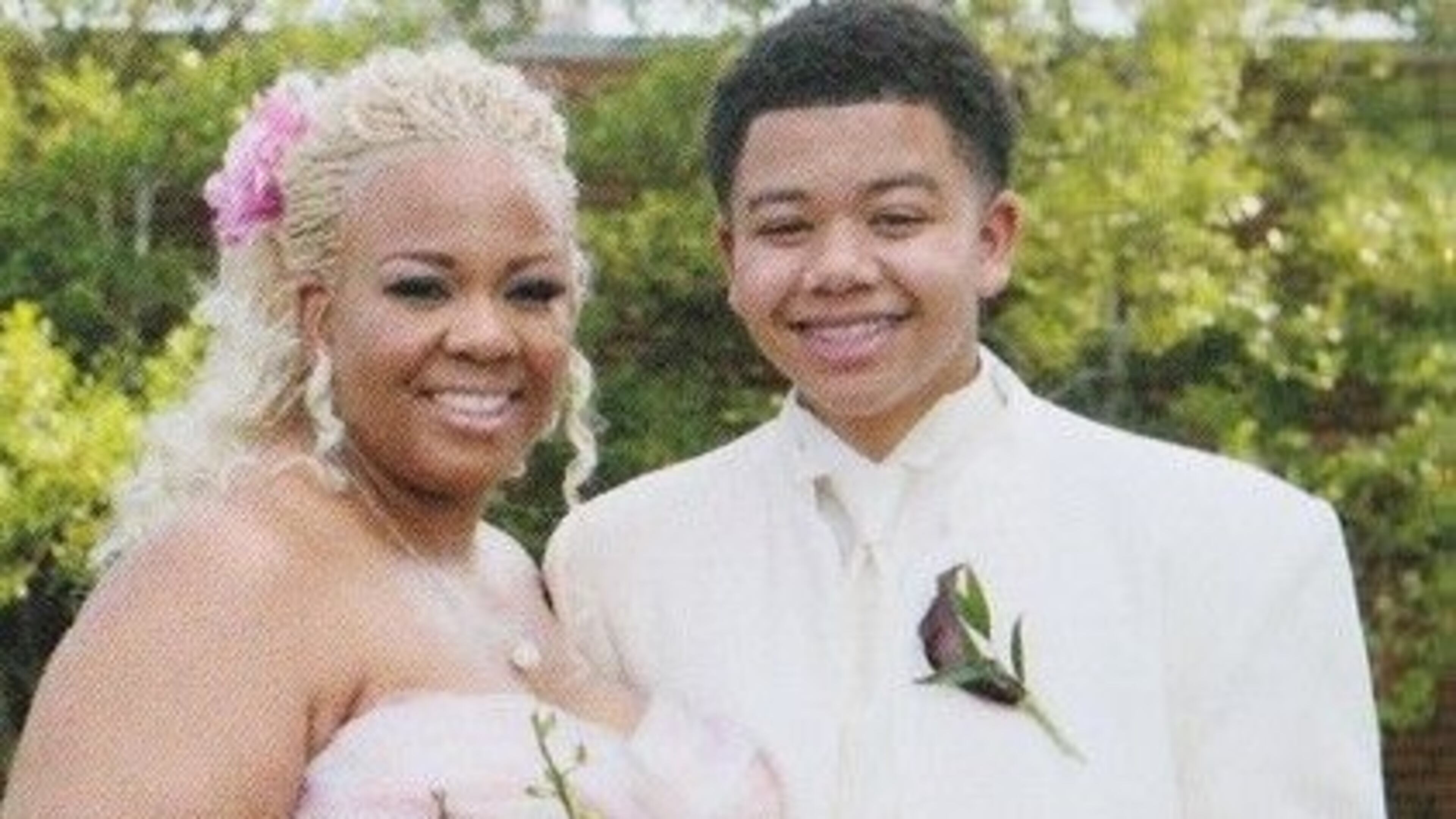 Nicole McIntosh and her son Nicholas on her wedding day in 2012.