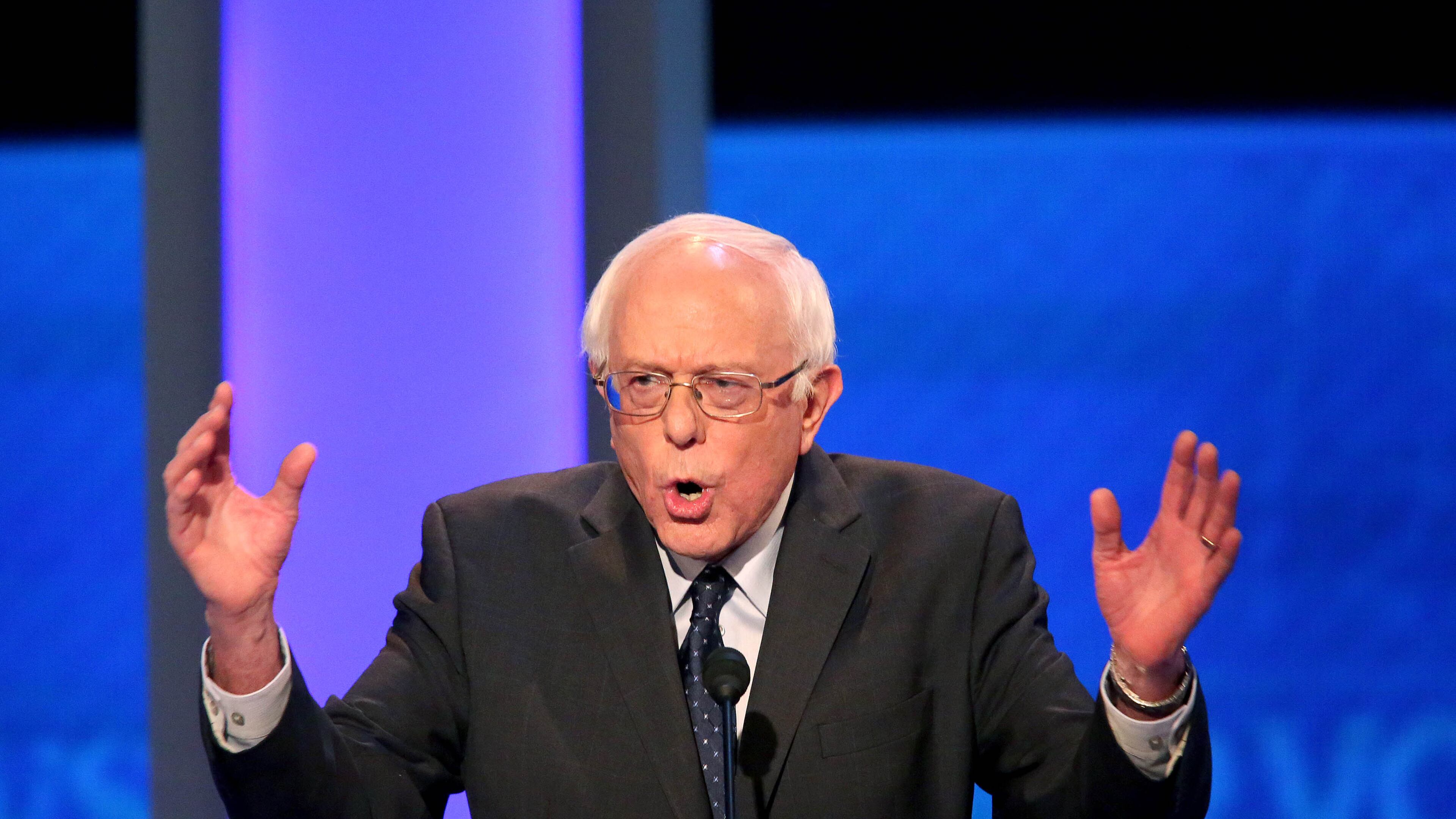 MANCHESTER, NH - DECEMBER 19: Democratic president candidate Bernie Sanders speaks at the debate at Saint Anselm College December 19, 2015 in Manchester, New Hampshire. This is the third Democratic debate featuring Democratic candidates Hillary Clinton, Bernie Sanders and Martin O'Malley. (Photo by Andrew Burton/Getty Images)