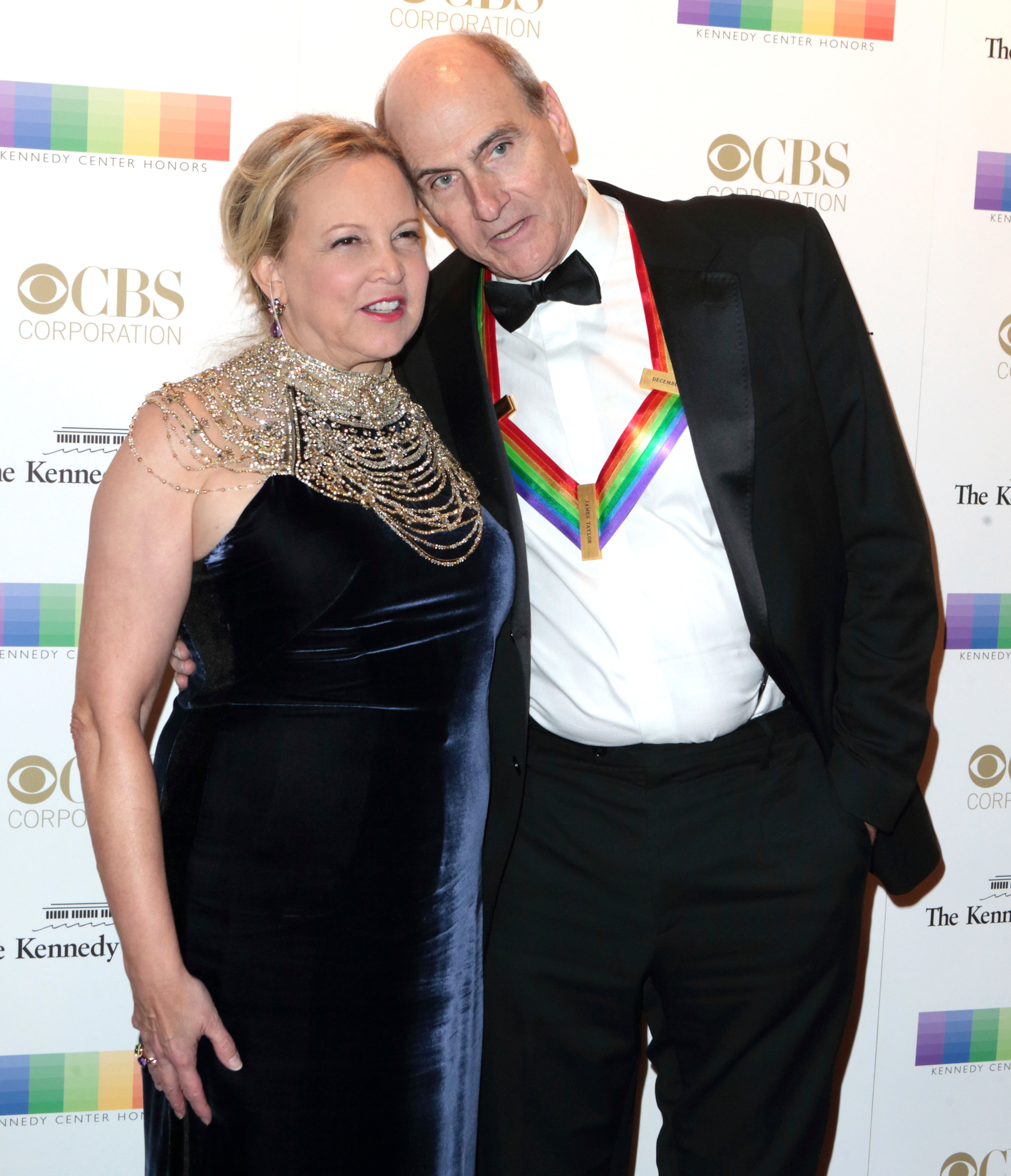 Kim Taylor, left, with her husband 2016 Kennedy Center Honoree James Taylor attend the Kennedy Center Honors gala at the Kennedy Center on Sunday, Dec. 4, 2016, in Washington. (Photo by Owen Sweeney/Invision/AP)