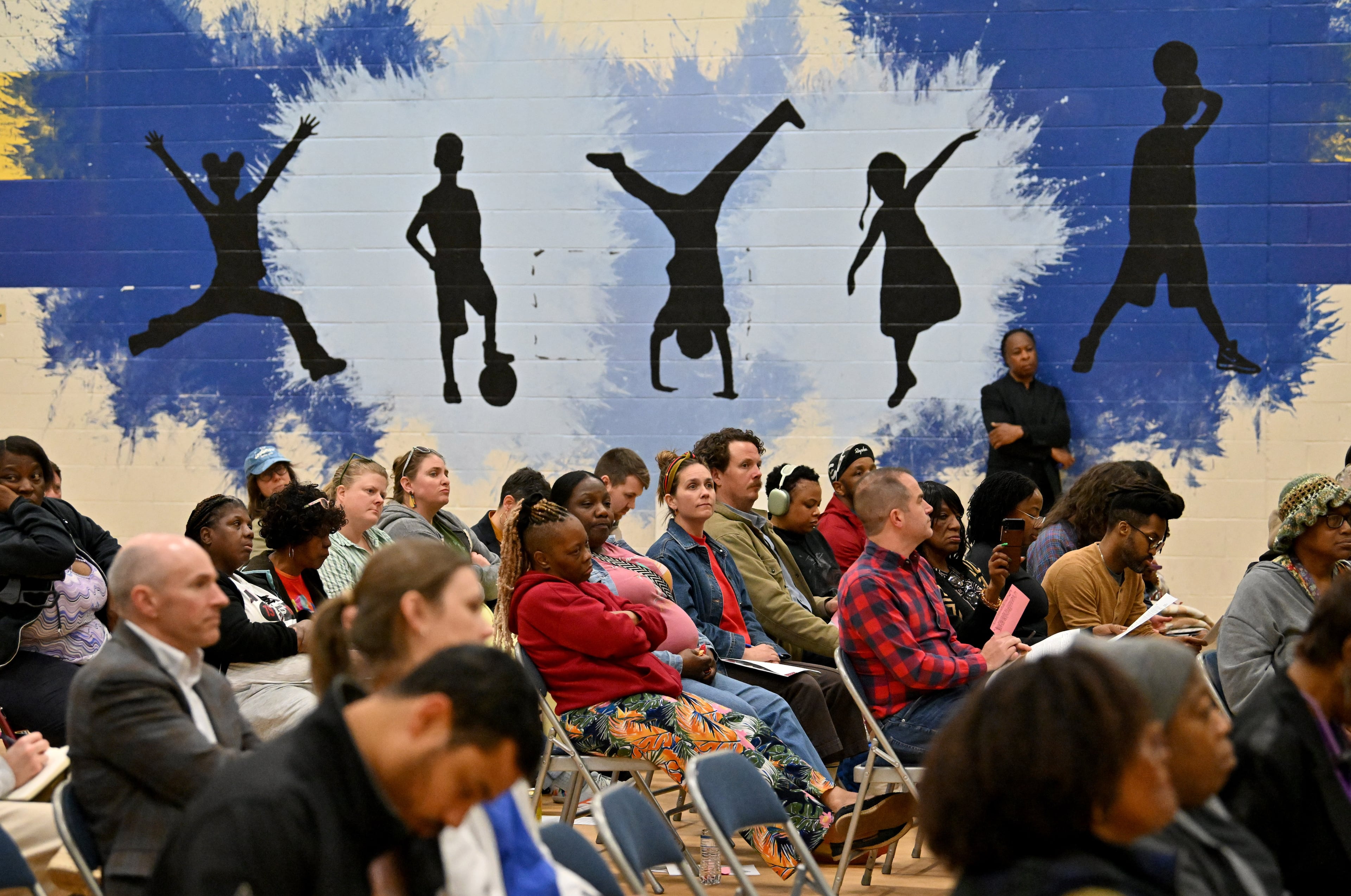 Attendees listen to presentations during a town hall by NPU-V and Digital Realty to discuss a planned data center March 19, 2026. (Hyosub Shin/AJC)