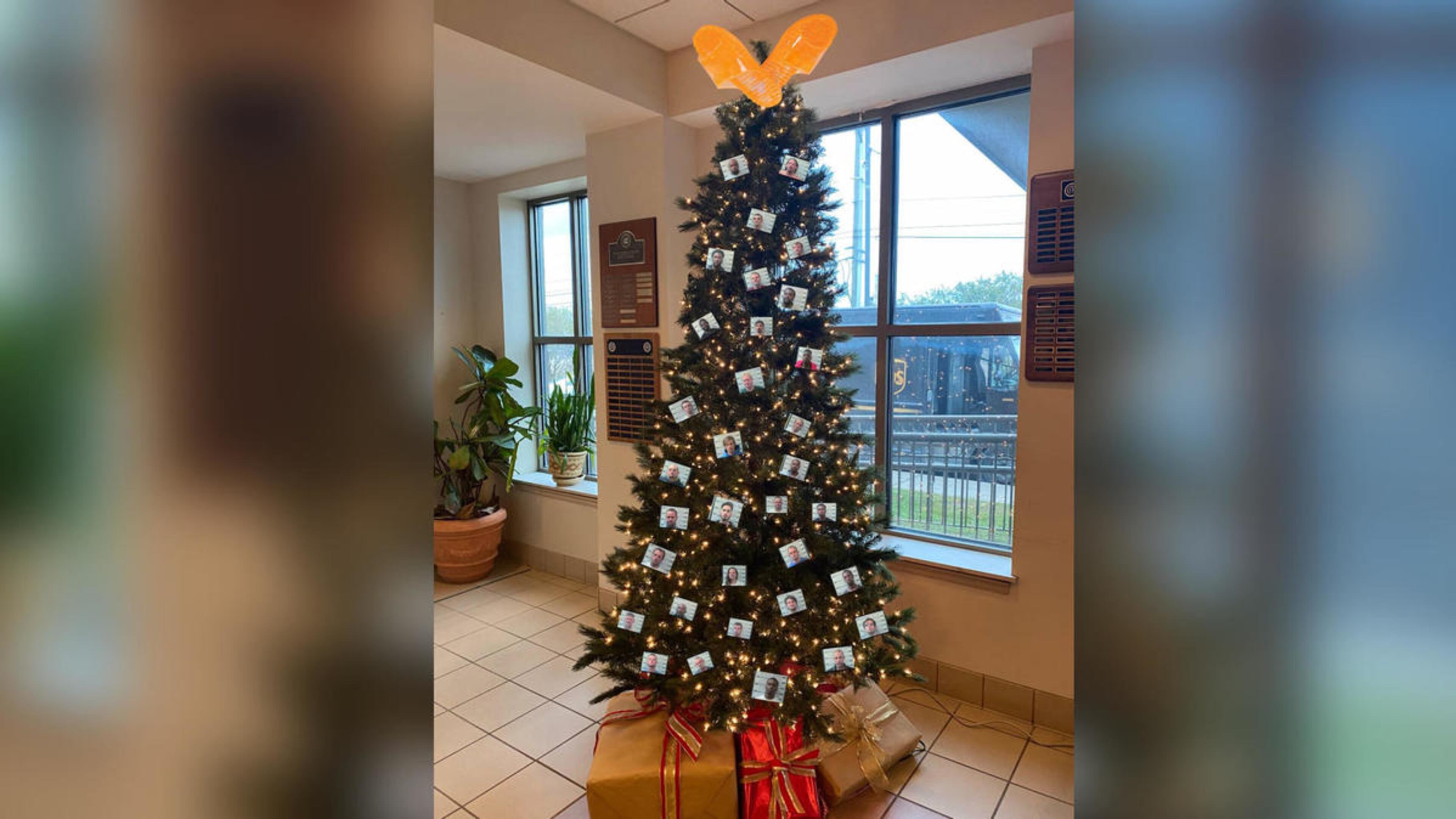 Officials from an Alabama sheriff’s department are being criticized for displaying a photo of a Christmas tree adorned with what they called “thugshots” of people who have been arrested.