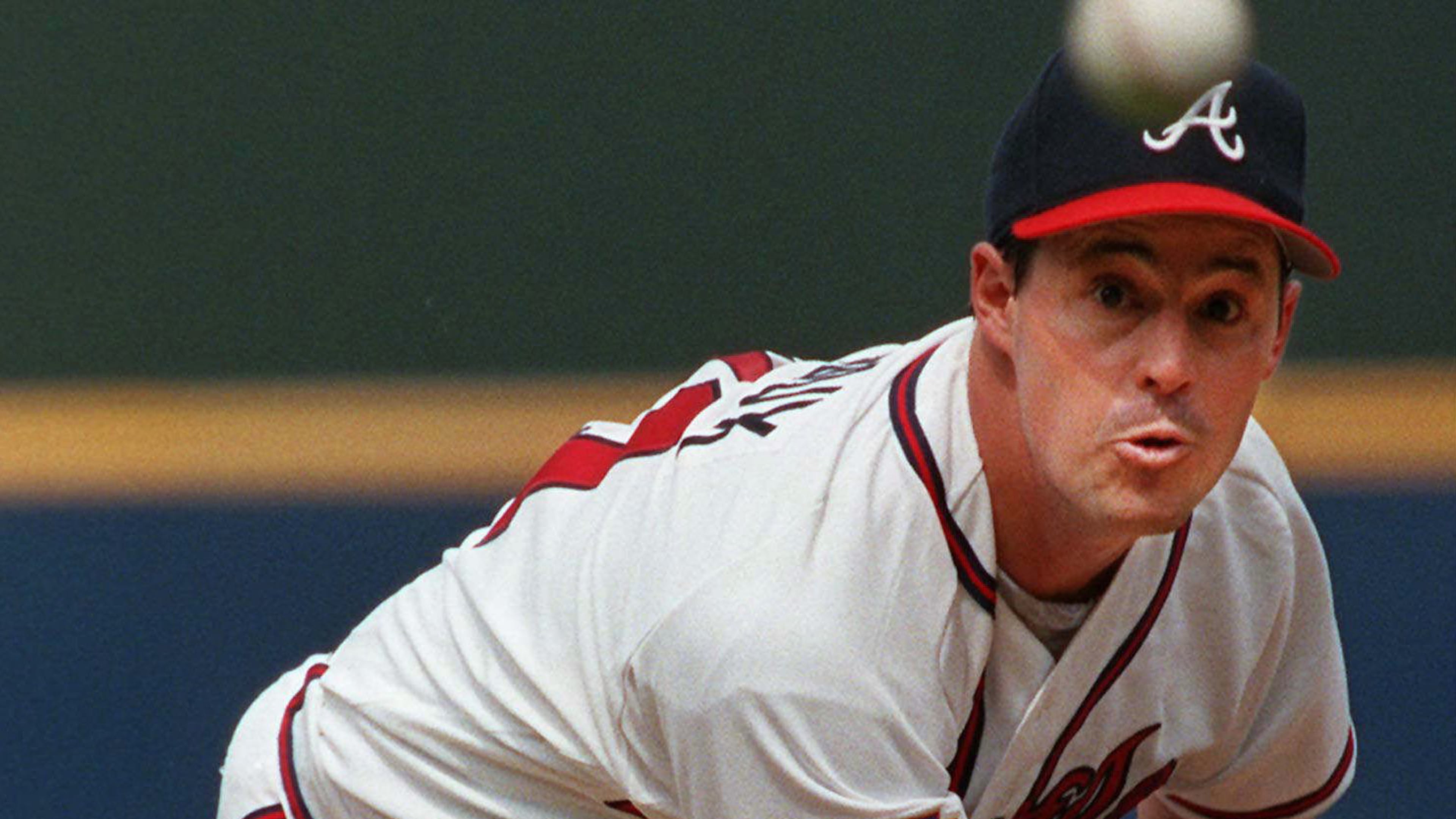 Atlanta Braves pitcher Greg Maddux throws to the plate during sixth inning of a baseball game against the Chicago Cubs in Atlanta The Braves plan to retire Maddux's No. 31 during a ceremony on July 17 in Atlanta. (AP Photo/John Bazemore, File)