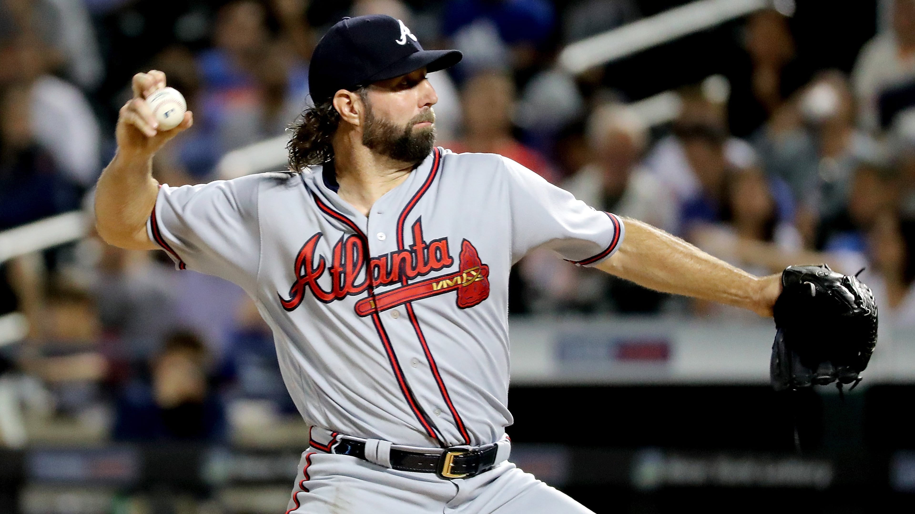 NEW YORK, NY - SEPTEMBER 26: R.A. Dickey #19 of the Atlanta Braves pitches during the first inning against the New York Mets on September 26, 2017 at Citi Field in Flushing neighborhood of the Queens borough of New York City. (Photo by Abbie Parr/Getty Images)