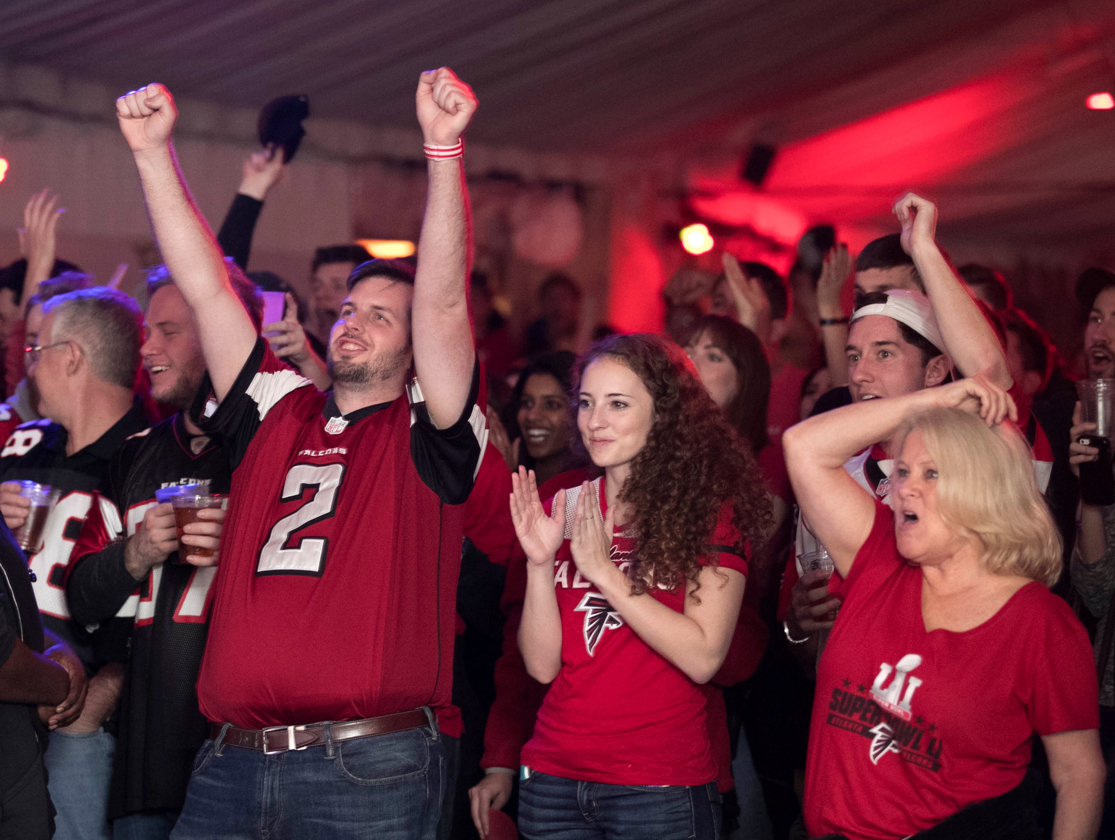 February 5, 2017 - Atlanta, Ga: Atlanta Falcons fans cheer before the start of Super Bowl 51 at Park Tavern Sunday February 5, 2017, in Atlanta. The Atlanta Falcons faced the New England Patriots in Super Bowl 51 in Houston. PHOTO / JASON GETZ