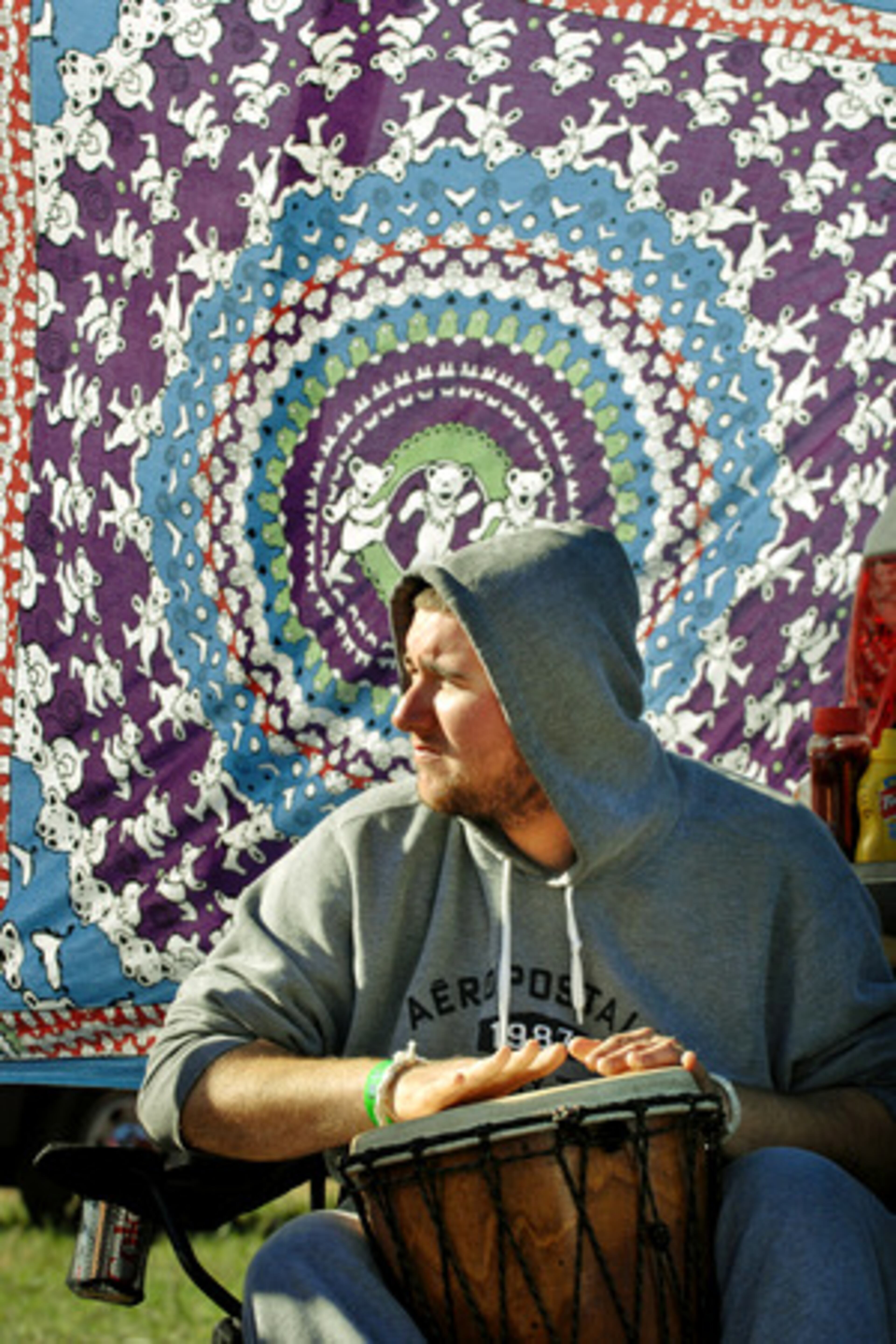 Kelsey Hugdins of Myrtle Beach, SC., plays his drums at his campsite while waiting for the start of the show. Hugdins, a huge Grateful Dead fan, said he and his friends were the first in line Thursday.