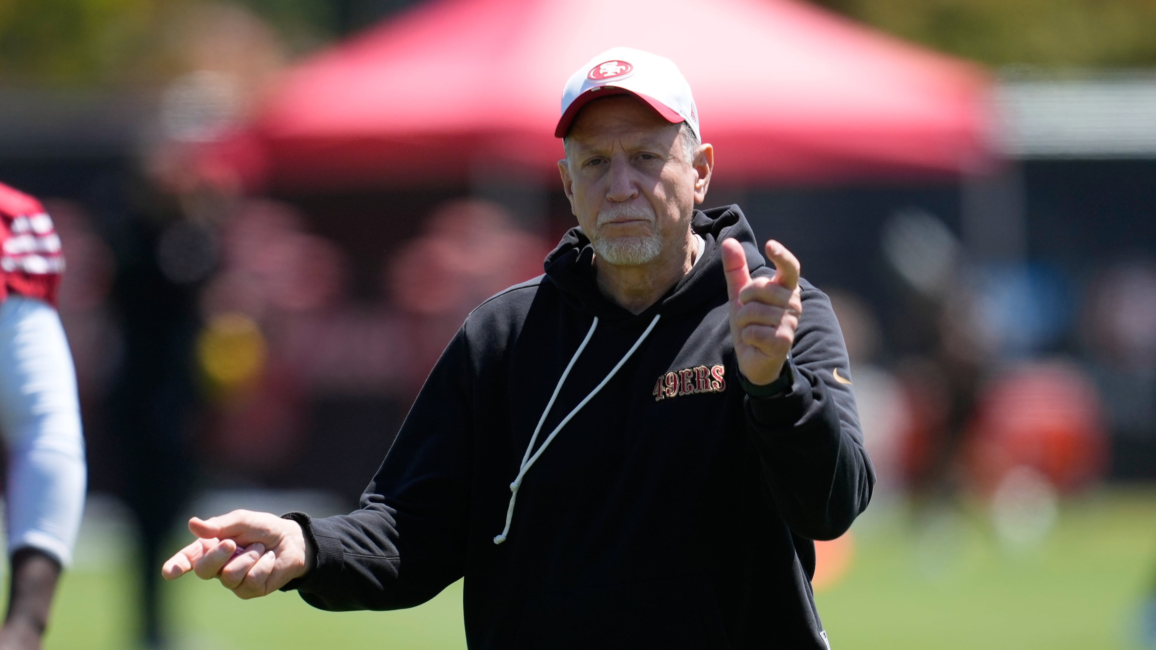 FILE - San Francisco 49ers assistant head coach/offensive line Chris Foerster gestures during the NFL football team's rookie minicamp Friday, May 8, 2026, in Santa Clara, Calif. (AP Photo/Jeff Chiu, File)