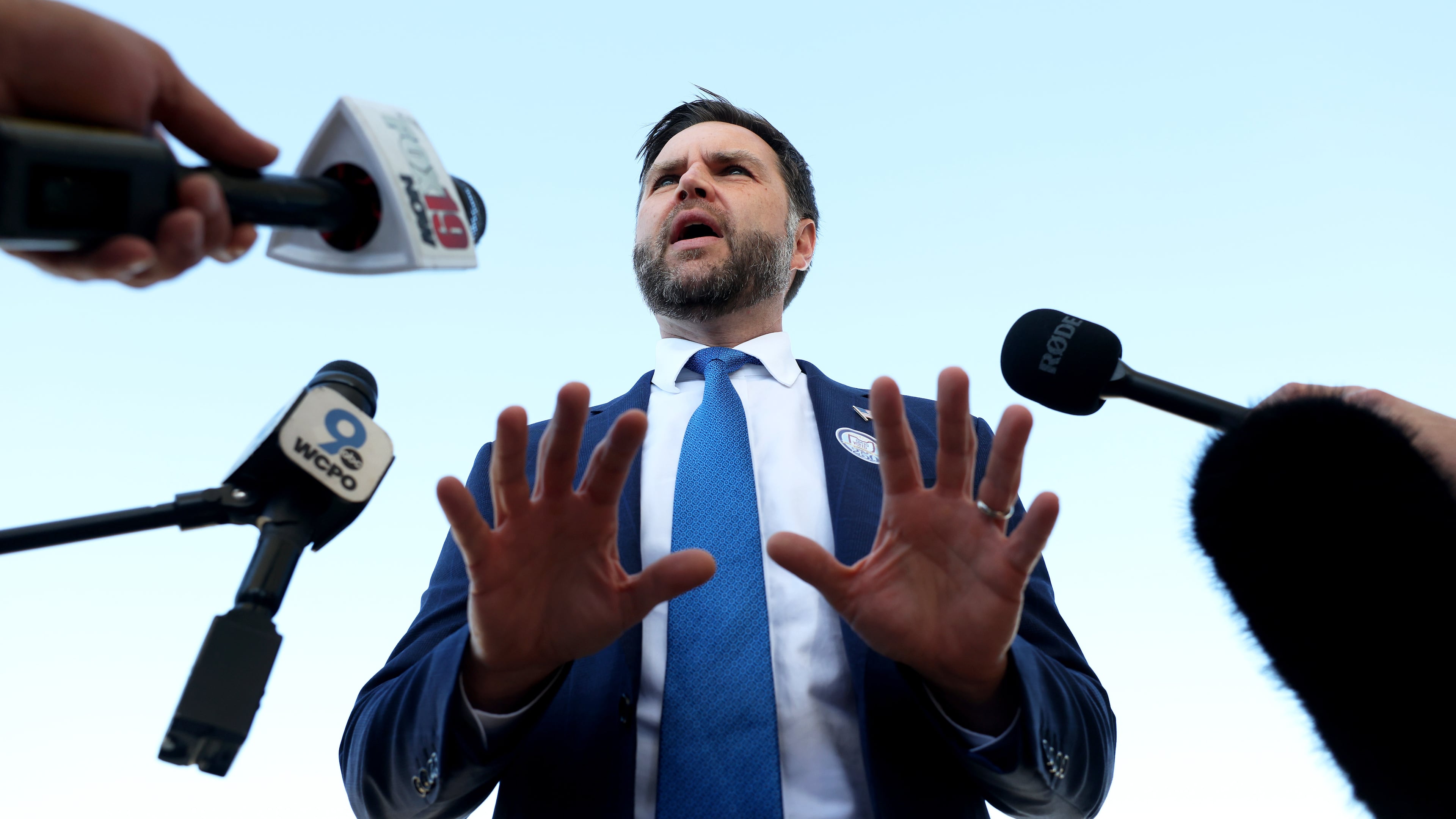 Vice President JD Vance speaks to members of the media at Cincinnati/Northern Kentucky International Airport, Friday, Oct. 9, 2026 in Hebron, Ky., as he departs for a rally in Lima, Ohio. (Samuel Corum/Pool Photo via AP)