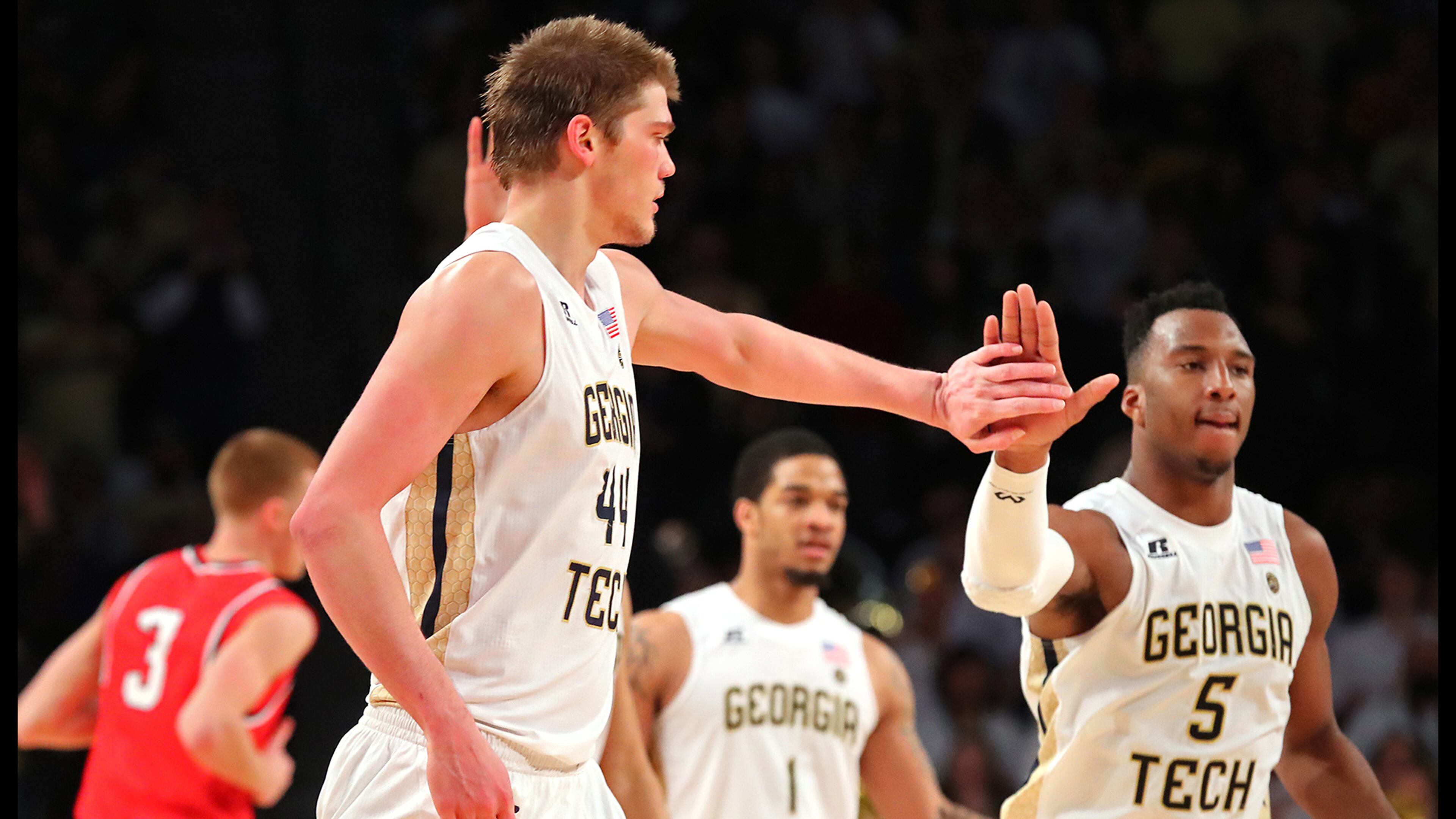 Georgia Tech center Ben Lammers and freshman guard Josh Okogie, here celebrating after a basket against Belmont in the NIT, both will return to the Jackets next season. (Curtis Compton/ccompton@ajc.com)