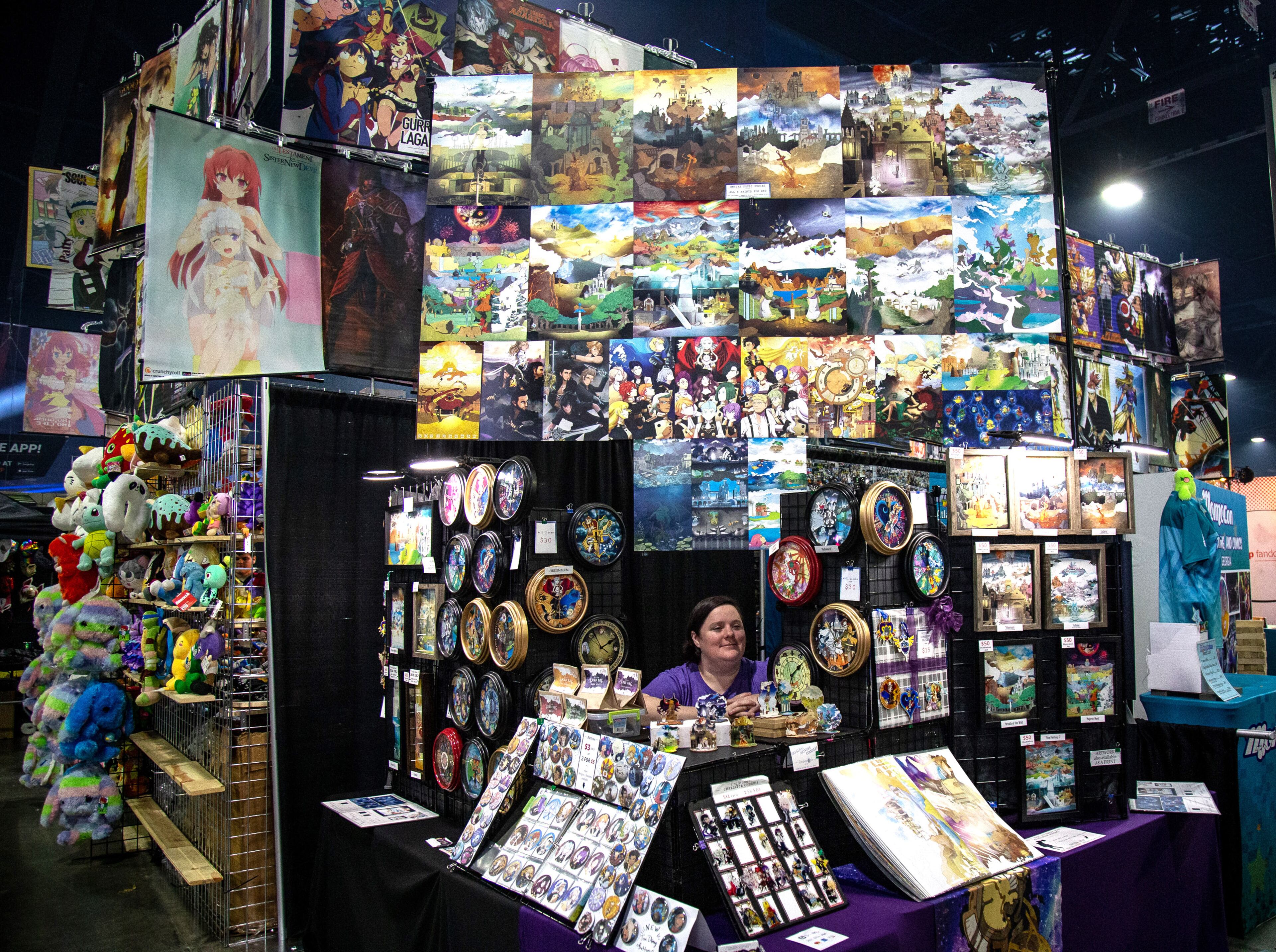 Noa Frezz sits among her fantasy landscapes at her booth during DreamHack Atlanta at the Georgia World Congress Center Sunday, November 17, 2019. STEVE SCHAEFER / SPECIAL TO THE AJC