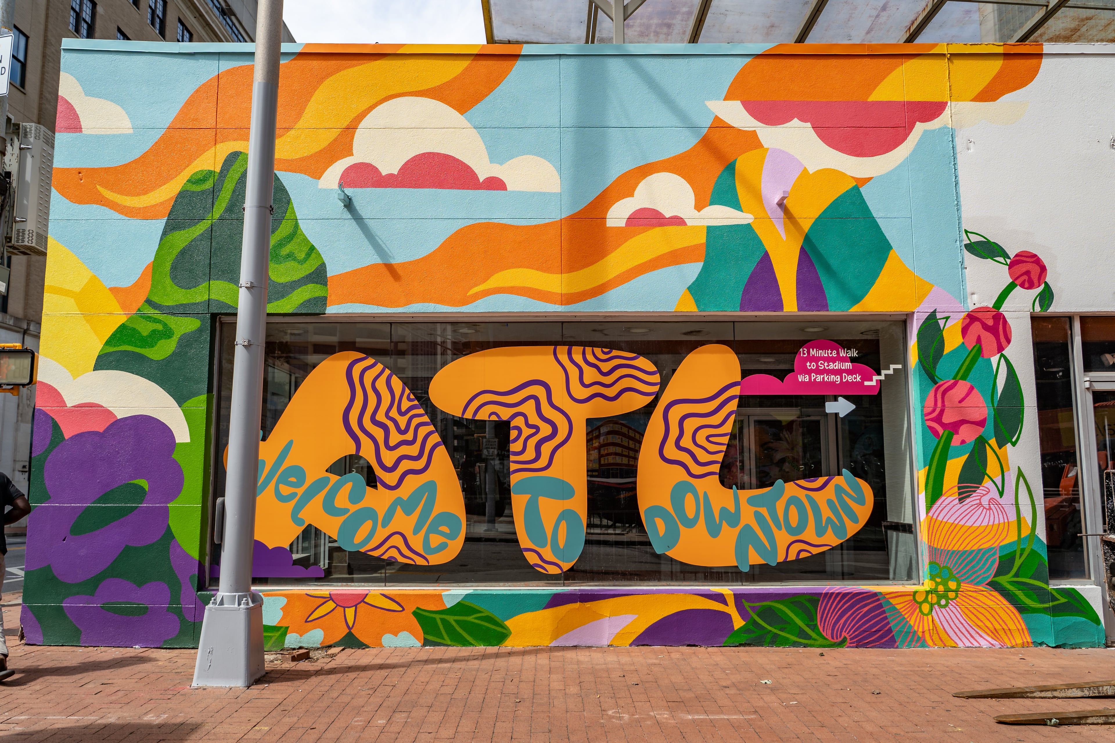 A mural created by artists Vanna Black and Verations adorns the front of a building along Forsyth Street on Friday, June 5, 2026. (Ben Hendren for the AJC)