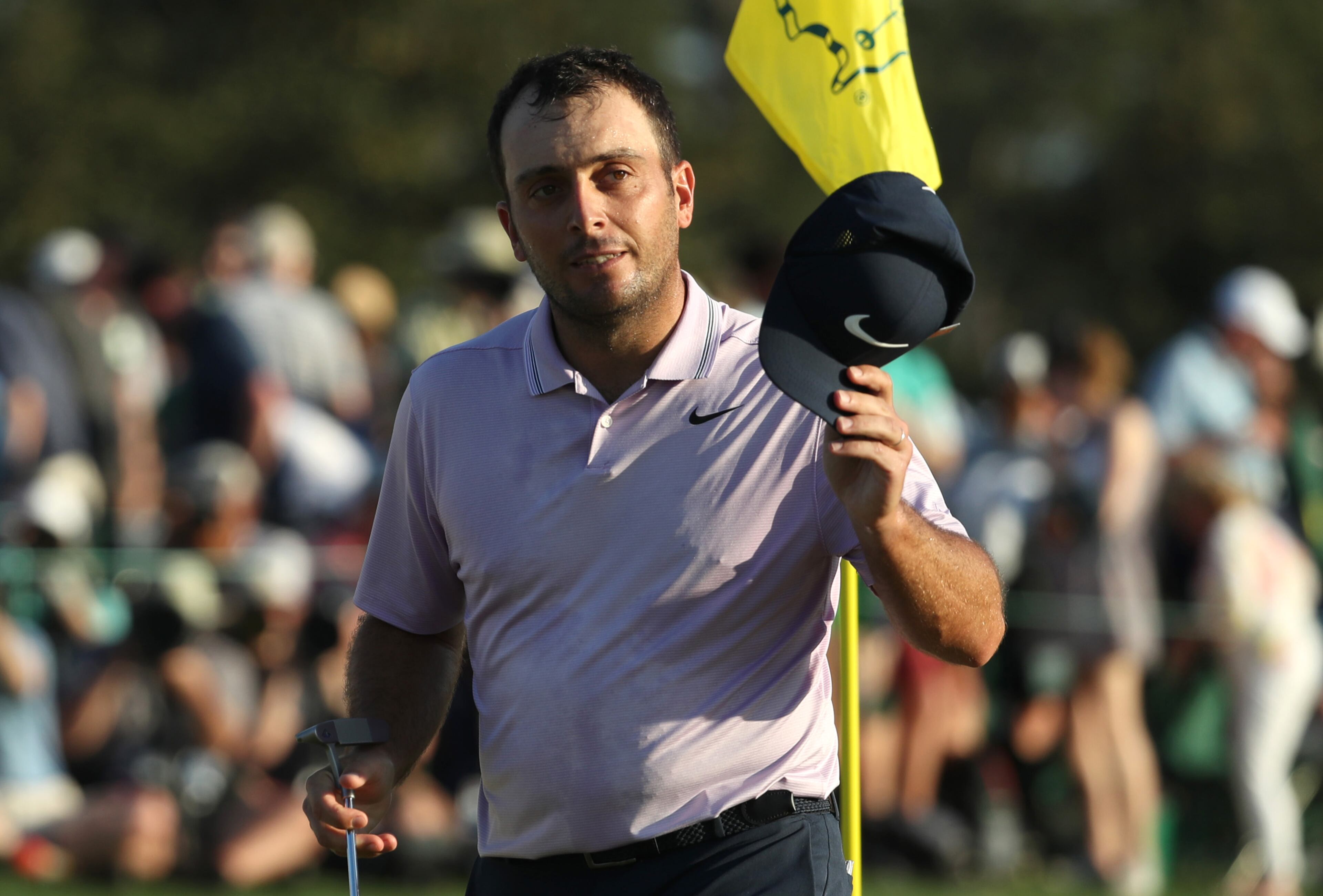 April 13, 2019 - Augusta, Ga: Francesco Molinari tips his hat after he finished the day 13 under for the lead during the third round of the Masters Tournament Saturday, April 13, 2019, at Augusta National Golf Club in Augusta. (JASON GETZ/SPECIAL TO THE AJC)