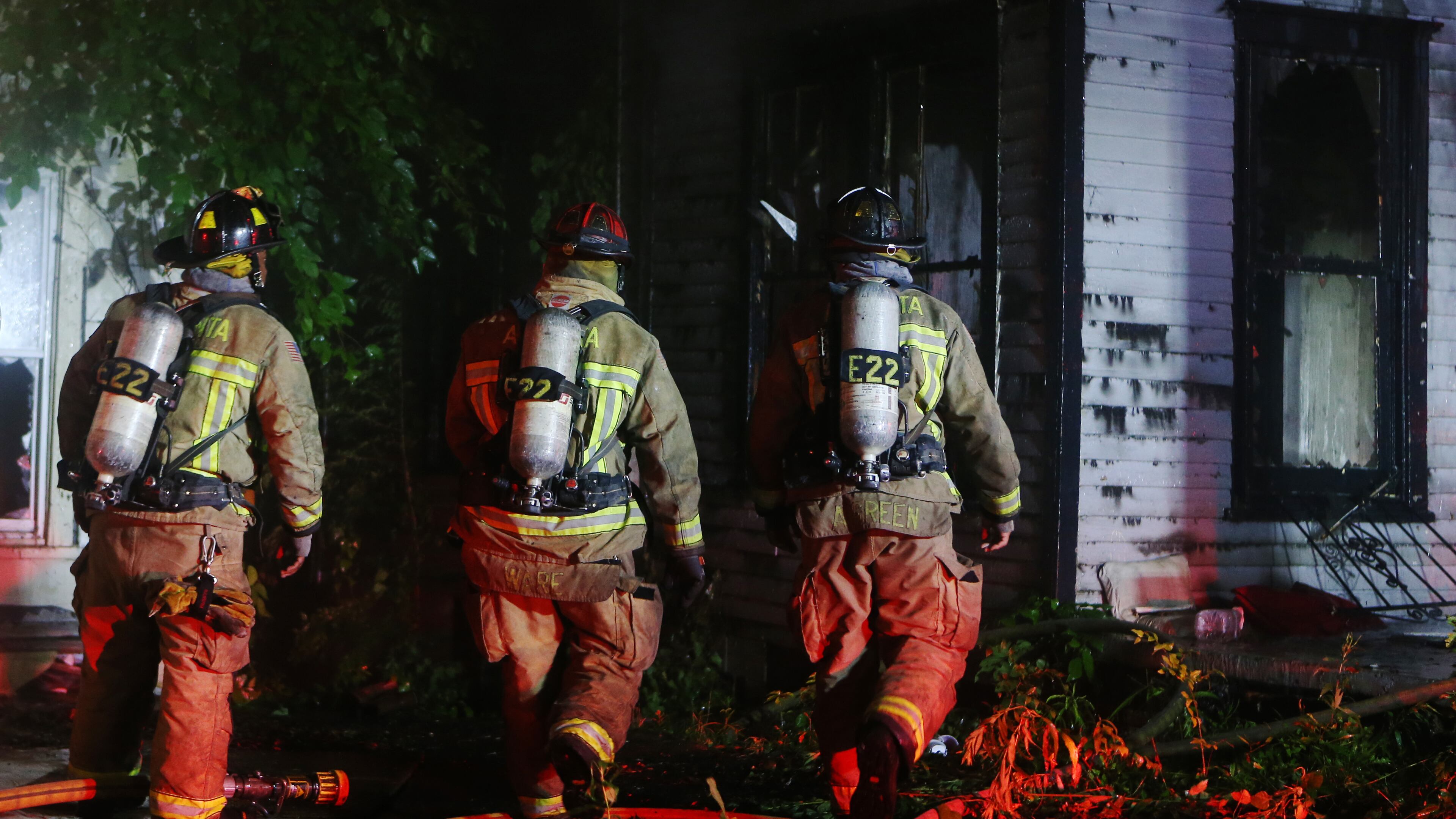 June 19, 2019 Atlanta- A firefighters from Atlanta Fire Rescue approach the scene of a two-house fire that resulted in one injury on the 600 block of James P. Brawley in Atlanta a little after 5 a.m. on Wednesday, June 19, 2019. Firefighters arrived to find a significant fire in the rear of a vacant home, according to Atlanta Fire Rescue Battalion Chief, Jason Wozniak. The fire spread quickly to an occupied adjacent home to the left of the burning vacant house. "We had to pull out of the main fire building and go defensive to put out the main body of fire," Wozniak said. Initial reports of a burn victim at the scene were unconfirmed, but a victim later admitted himself at Grady hospital said Atlanta Fire Rescue Spokesperson Sgt. Cortez Stafford. It was not known whether the victim came from the vacant or occupied structure. The fire is under investigation. CHRISTINA MATACOTTA/CHRISTINA.MATACOTTA@AJC.COM