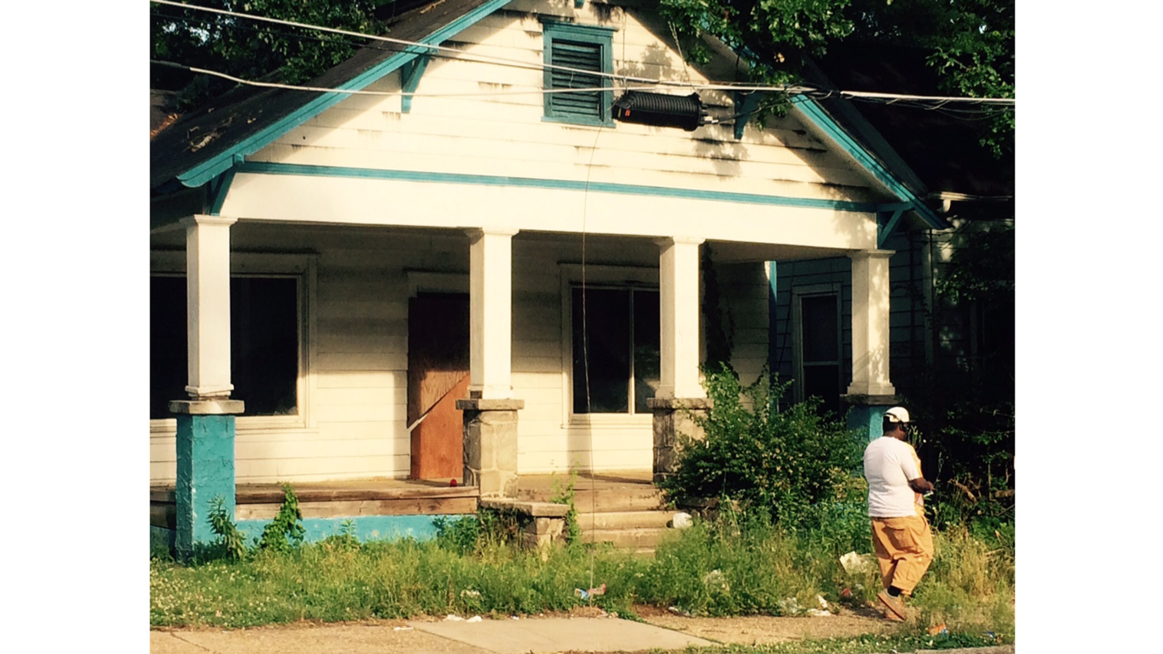 The abandoned house at 479 James P. Brawley Drive is owned by real estate investor Rick Warren who the city is prosecuting on codes violations. The street is an example of the intractable problem the city has had in working to salvage the neighborhood just west of the Georgia Aquarium.