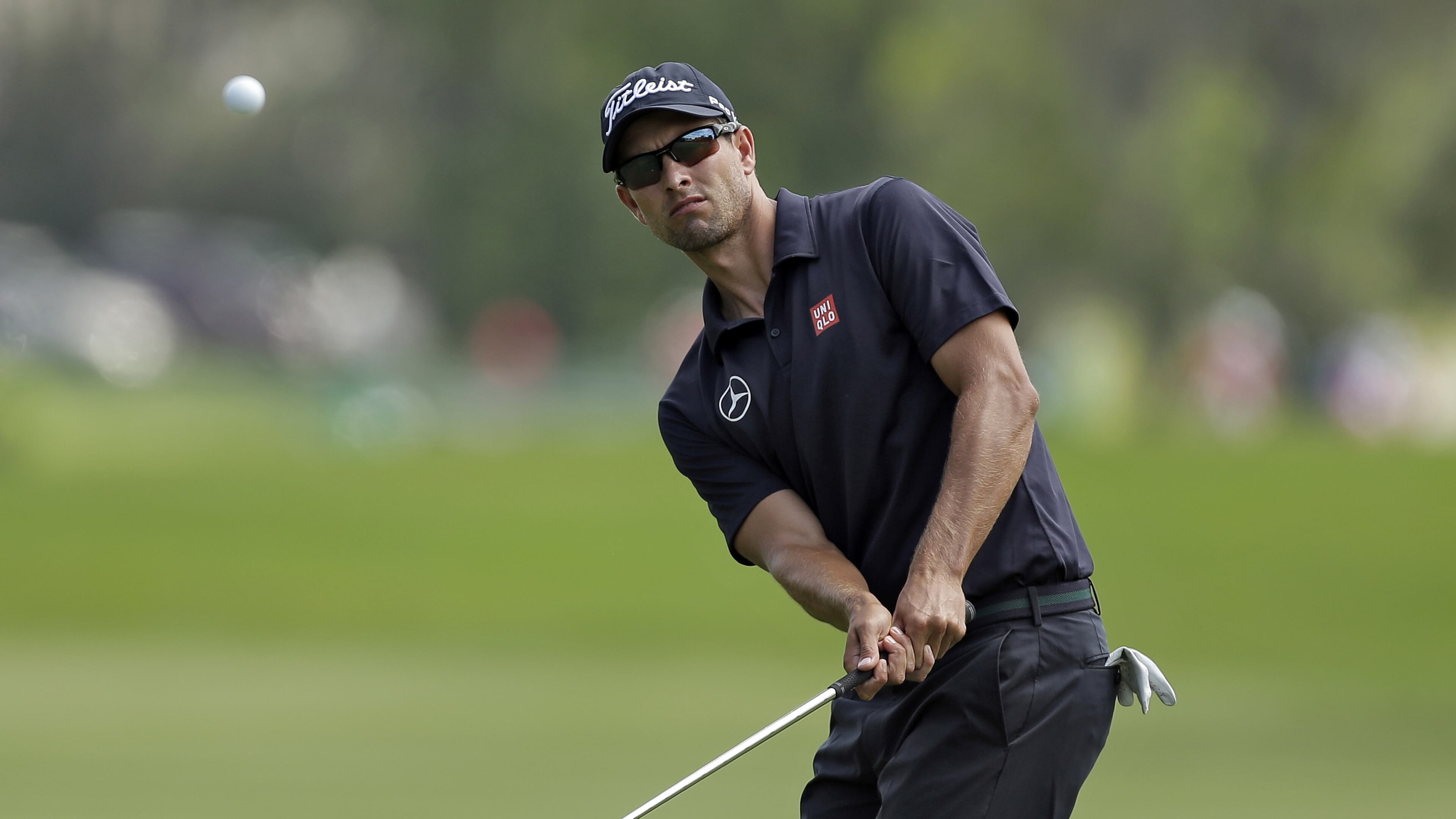 Adam Scott, of Australia, chips onto the fifth green during the final round of the Arnold Palmer Invitational golf tournament at Bay Hill, Sunday, March 23, 2014, in Orlando, Fla.