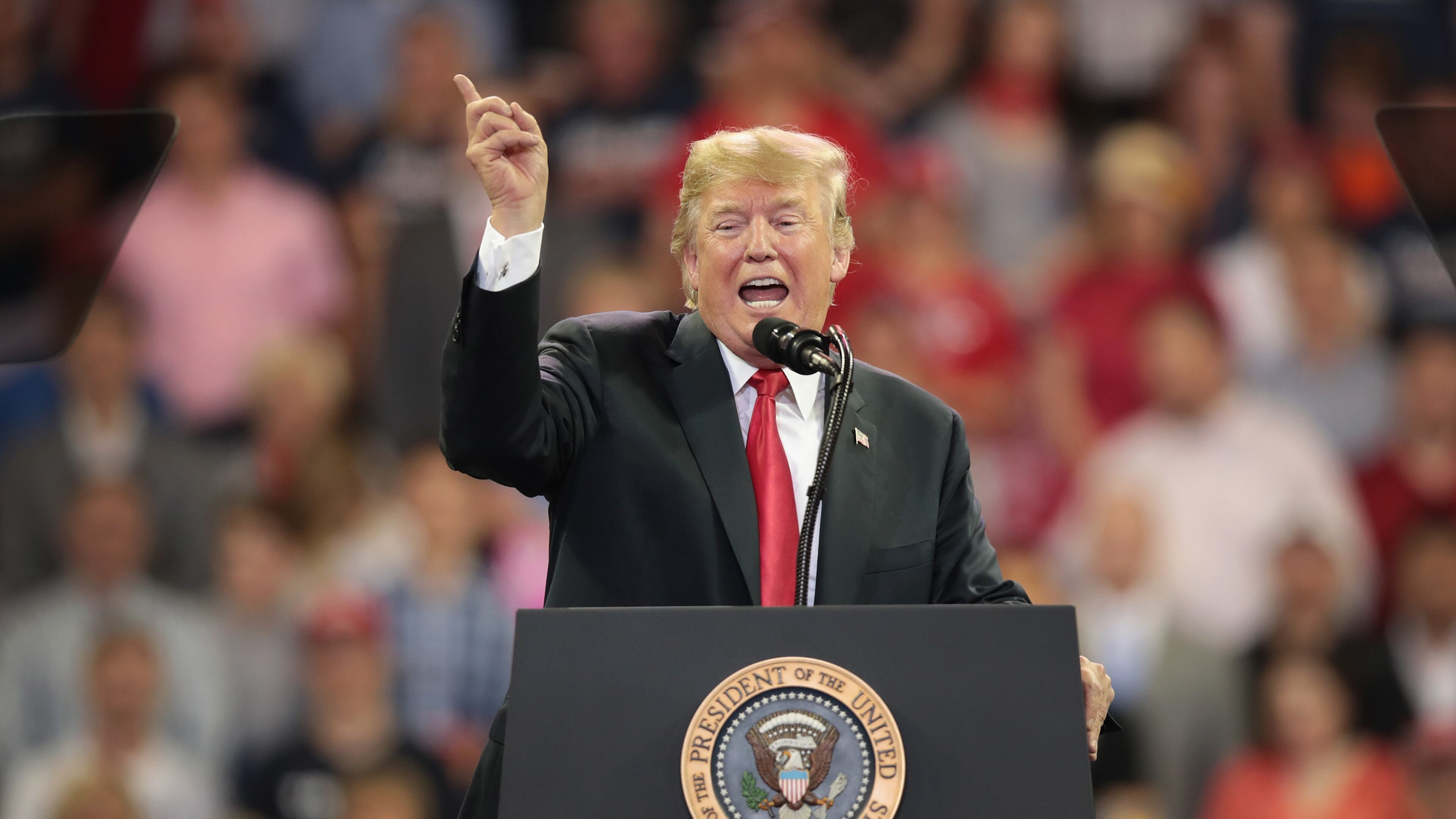 President Donald Trump speaks to supporters during a campaign rally at the Amsoil Arena Duluth, Minn., on Wednesday. Scott Olson/Getty Images