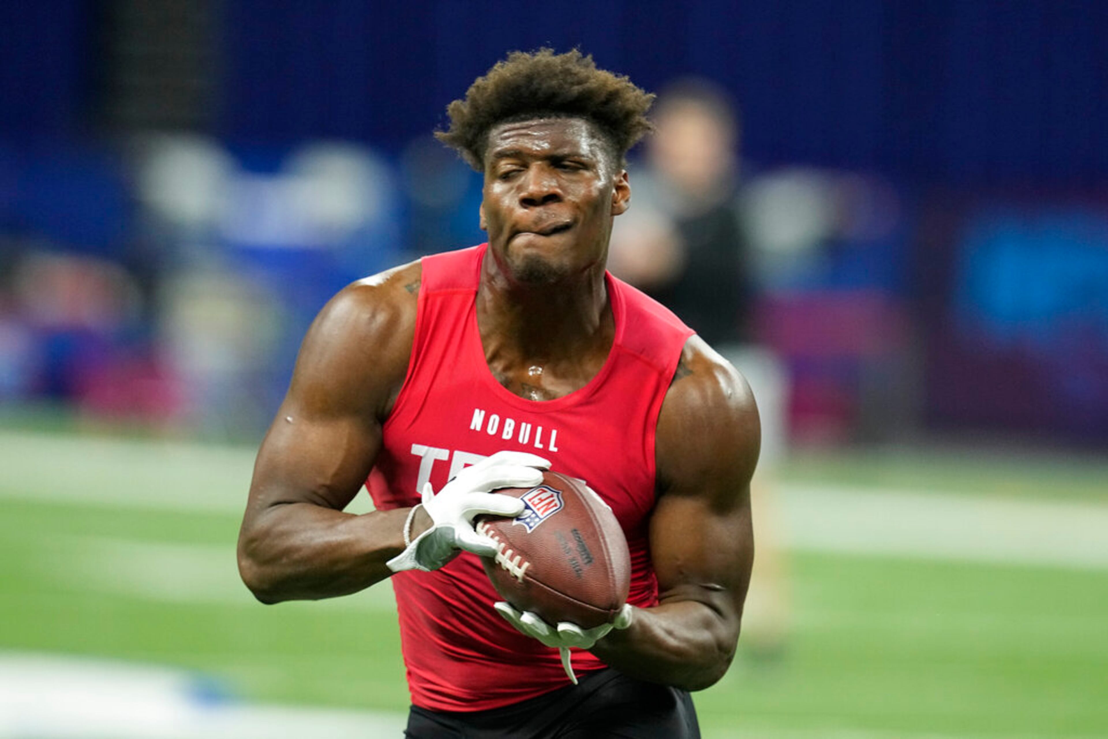 Georgia tight end Darnell Washington runs a drill at the NFL football scouting combine in Indianapolis, Saturday, March 4, 2023. (AP Photo/Darron Cummings)