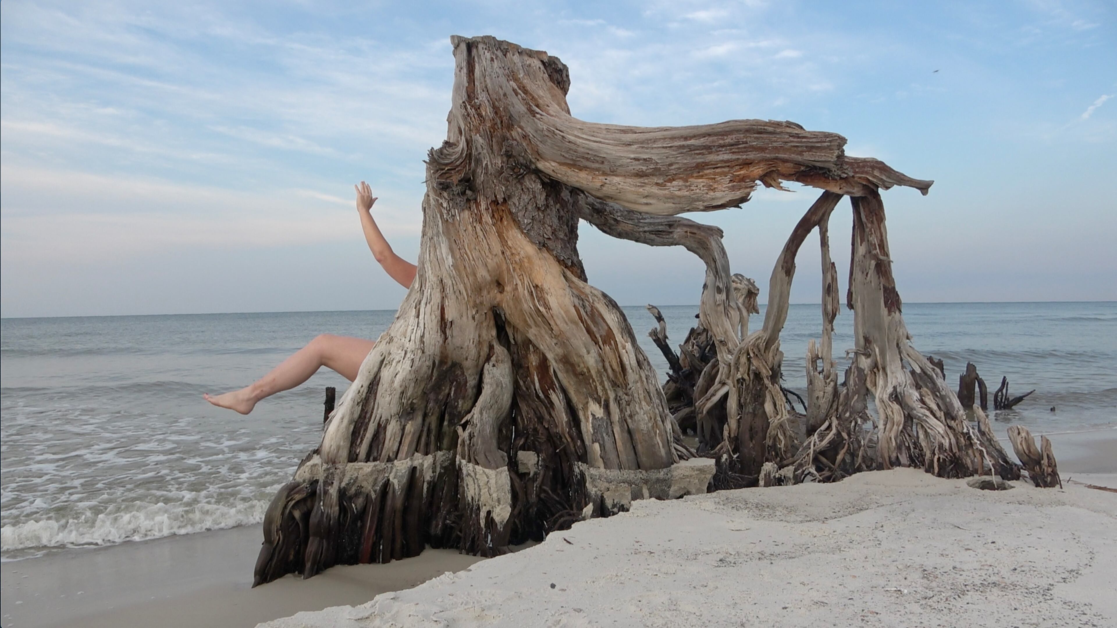 Jaime Bull’s "The Stump Hole" includes soft sculptures of the female body exhibited alongside two photographs of differently arranged figures on Florida beaches.