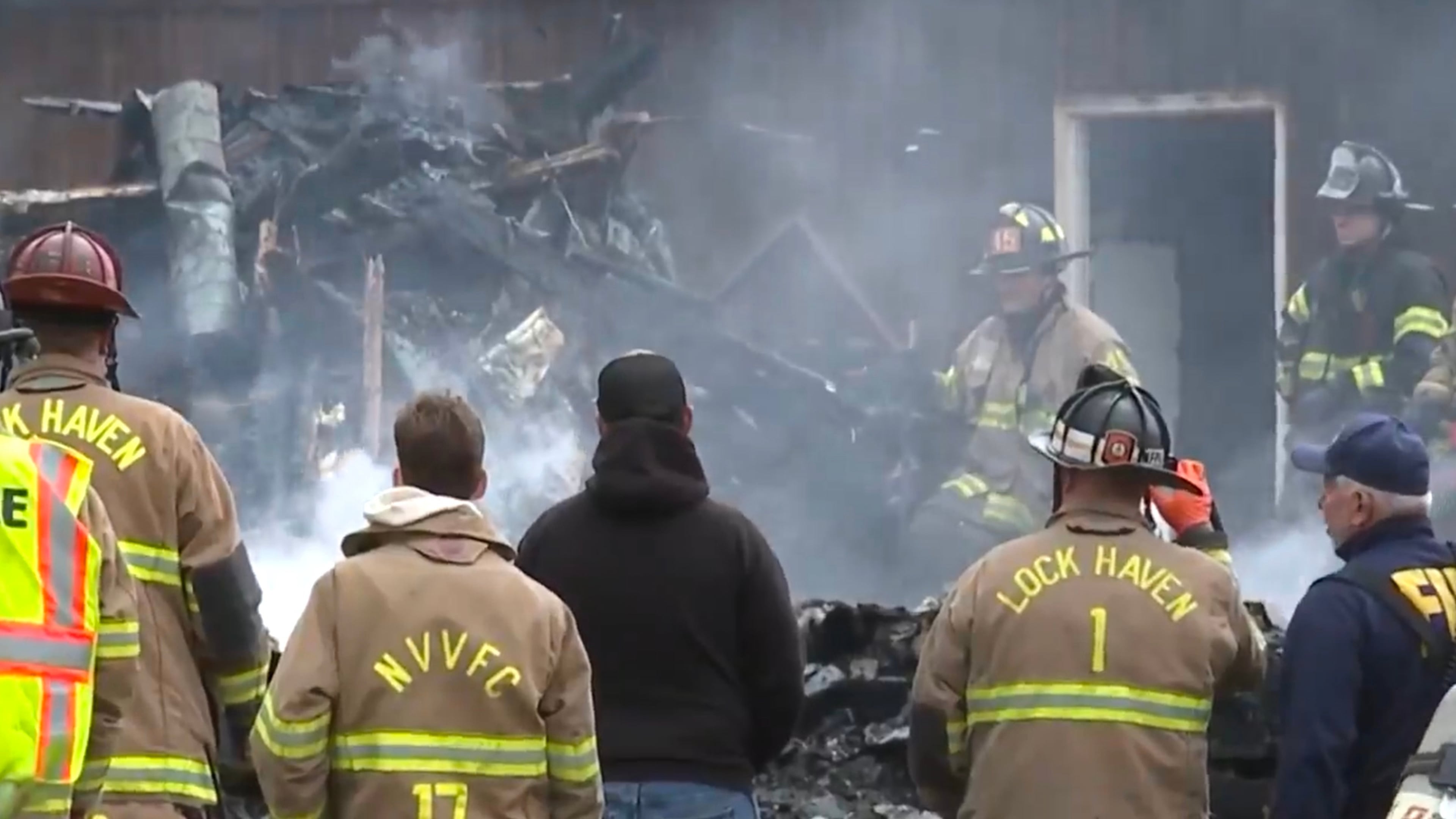 This photo made from video from WNEP shows first responders at the scene of an explosion and fire in Lamar Township near Mill Hall, Pa., Sunday, April 19, 2026. (WNEP via AP)