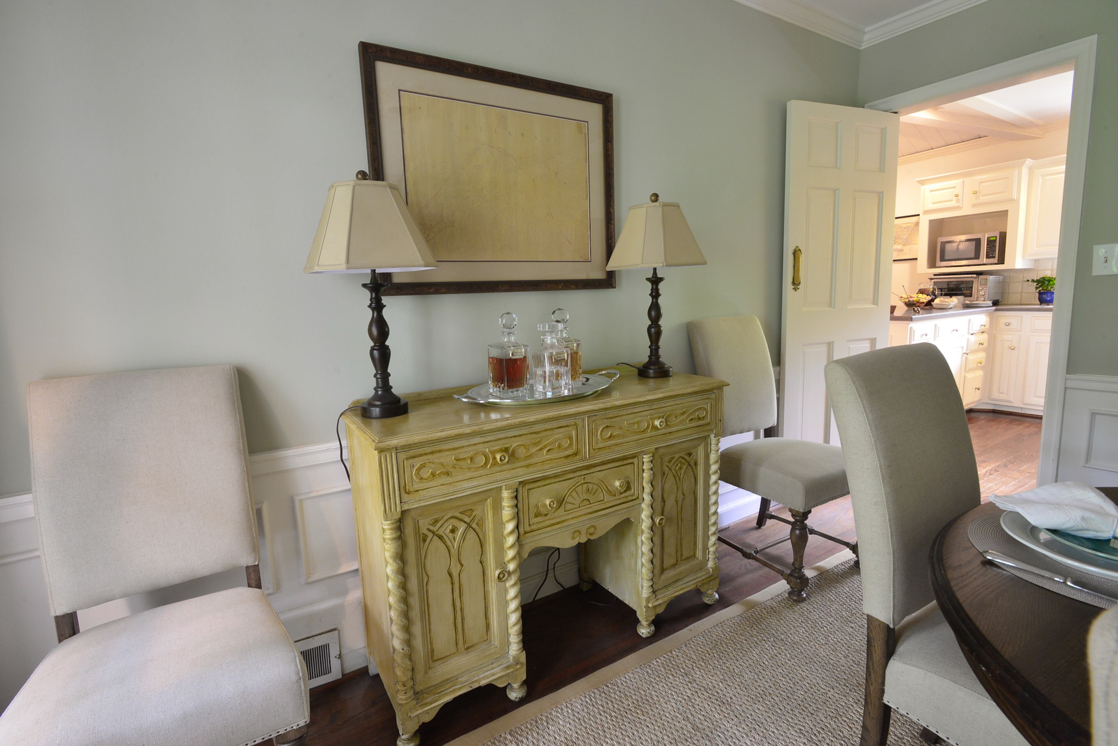 TJ Callaway's family tree, which dates back to when Thomas Callaway emigrated from Cornwall, England, to Charles County, Va., in 1665, creates conversation in the dining room, above a buffet passed down from his wife's grandparents.