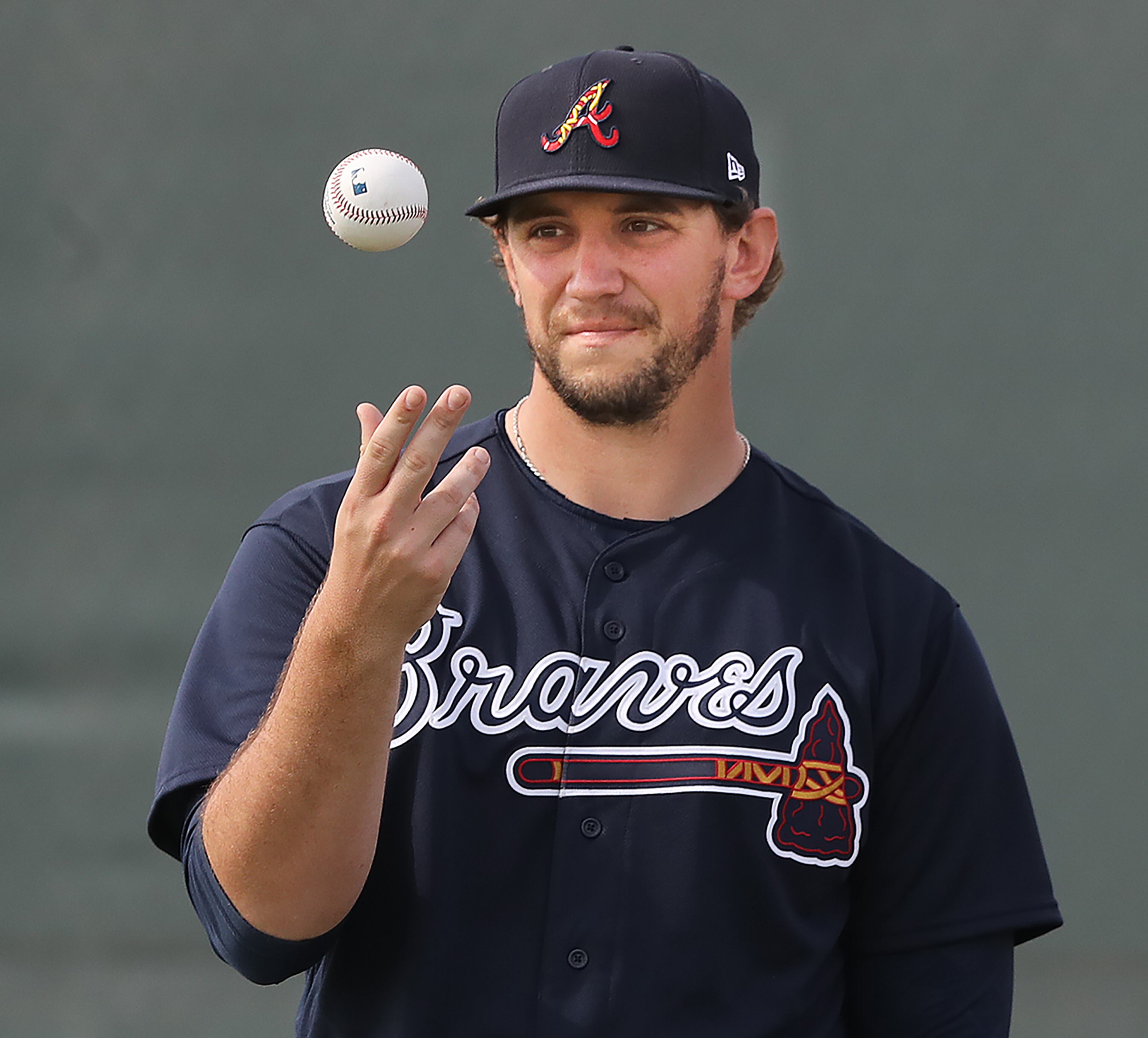 Braves pitcher Patrick Weigel loosens up during spring training on Friday, Feb. 14, 2020, in North Port. Curtis Compton ccompton@ajc.com