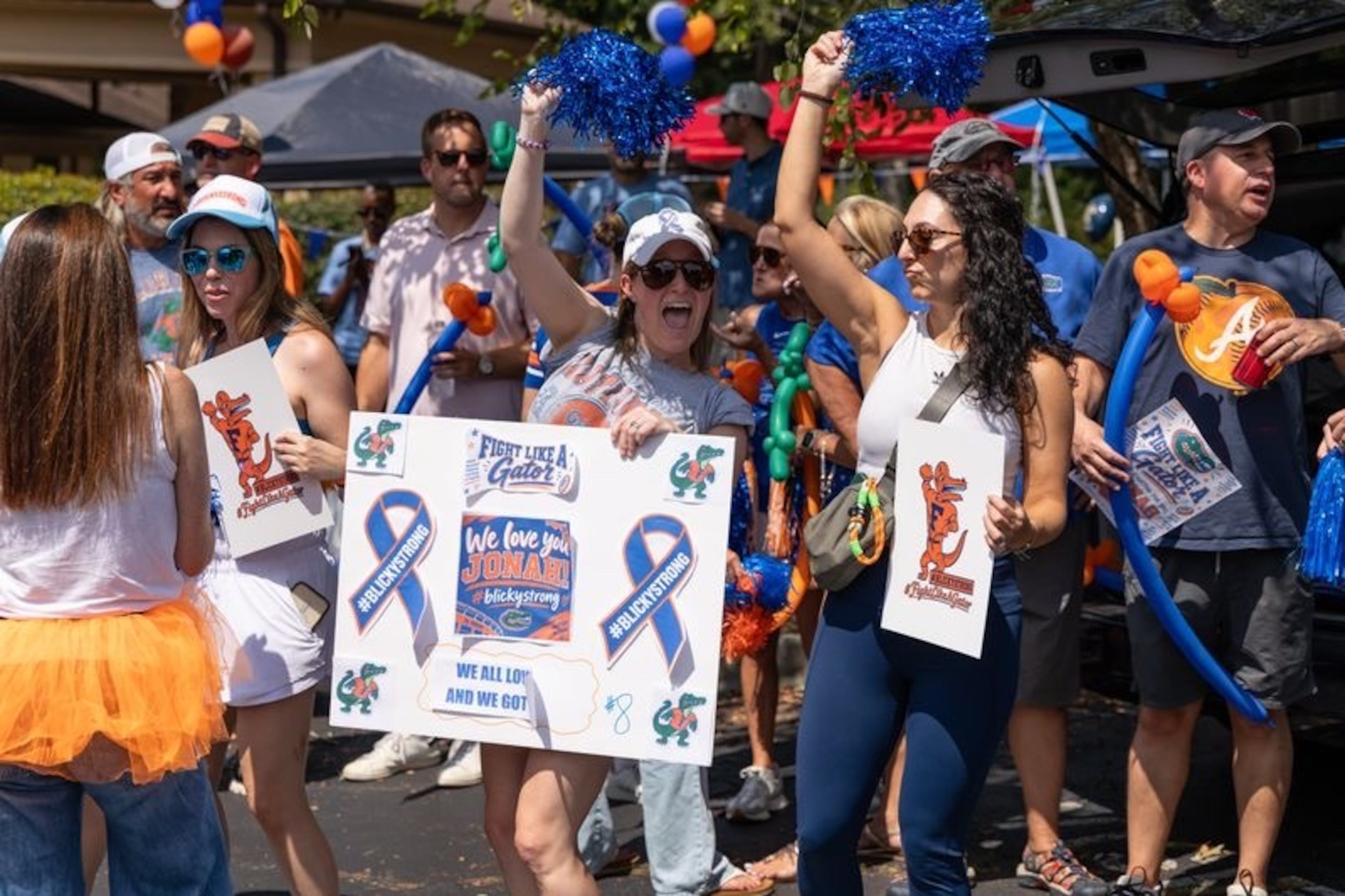 Friends and family decked out in Florida’s orange and blue show their support for Jonah during a surprise event. Even lifelong Georgia fans donned the closest thing they had to Gator attire. (Courtesy of Steven Dewberry)