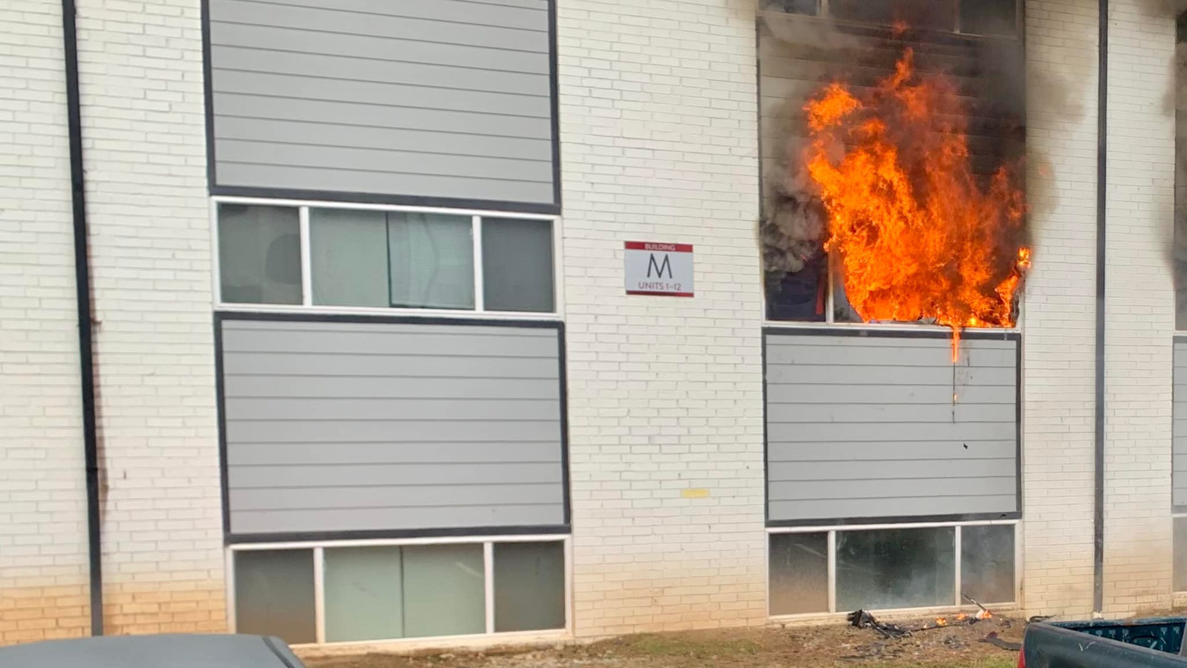 DeKalb County fire crews arriving Sunday morning at the Austin Oak Apartments on Glenwood Road found flames and smoke coming from a second-floor apartment.