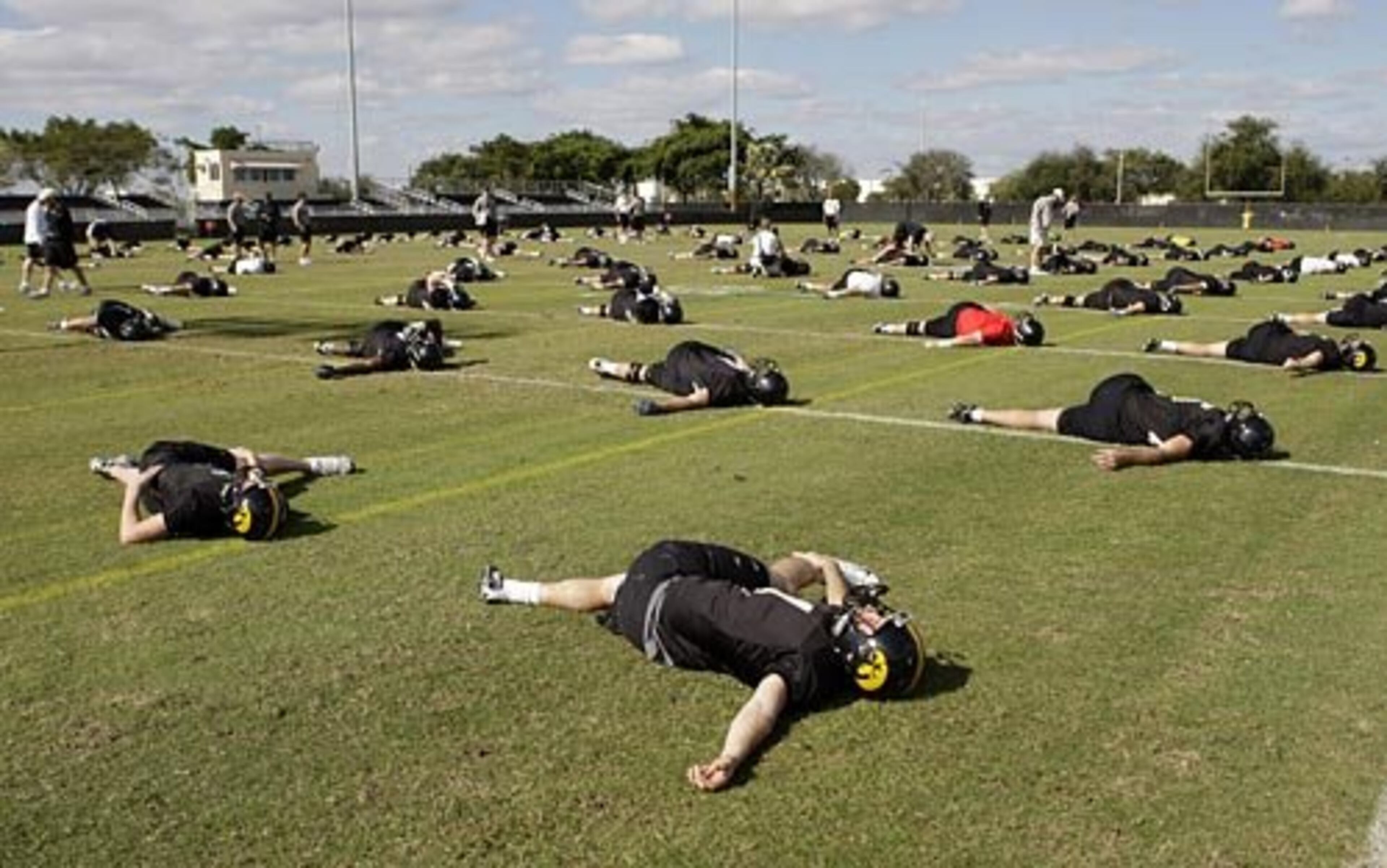 The Hawks limber up in the warm Florida sunshine during practice.
