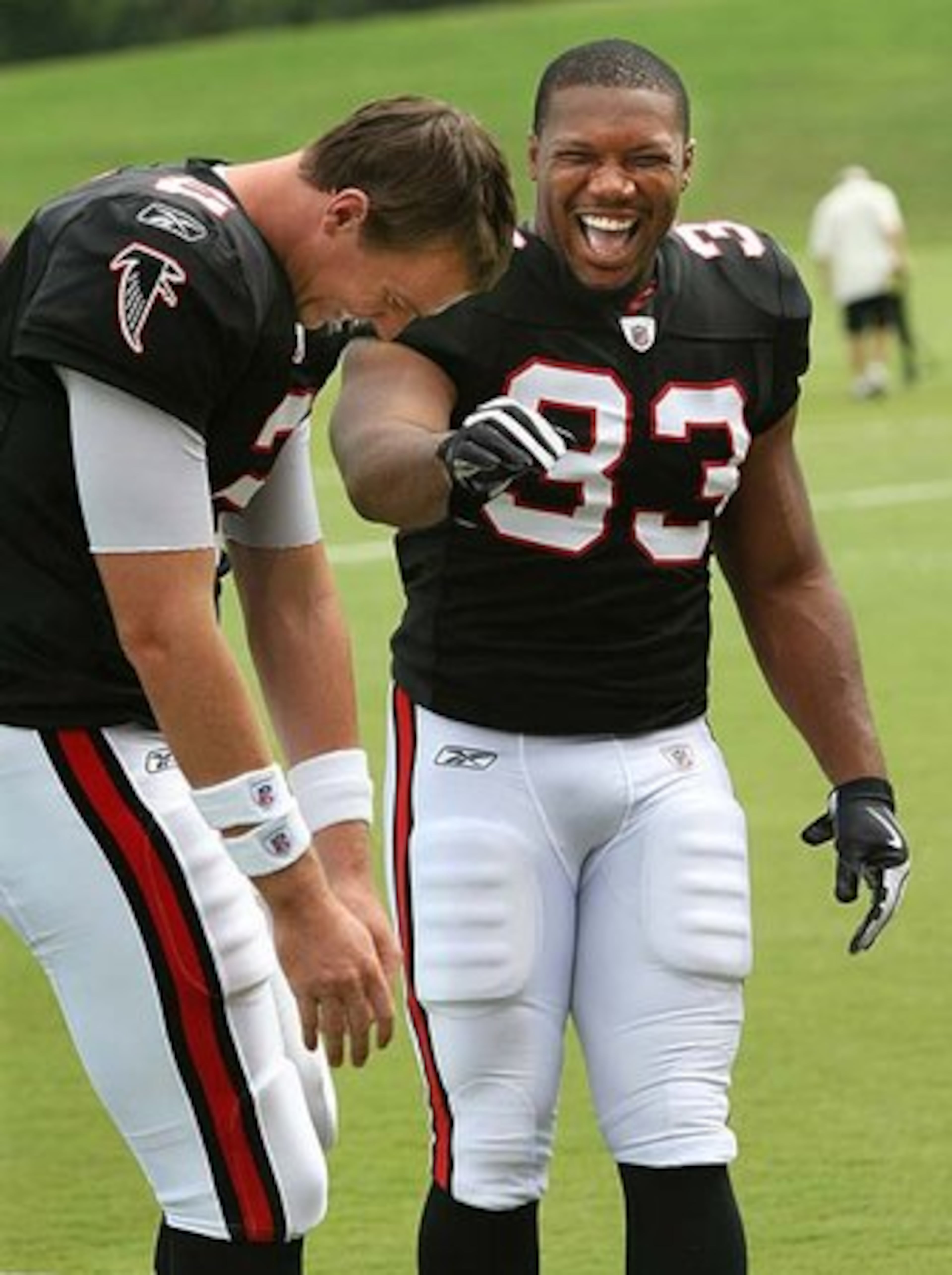 LIKING THE LOOK: "They look good," running back Michael Turner (right, with Matt Ryan) said. "I like wearing throwbacks. I like wearing something different for a change. Especially if they look sharp."