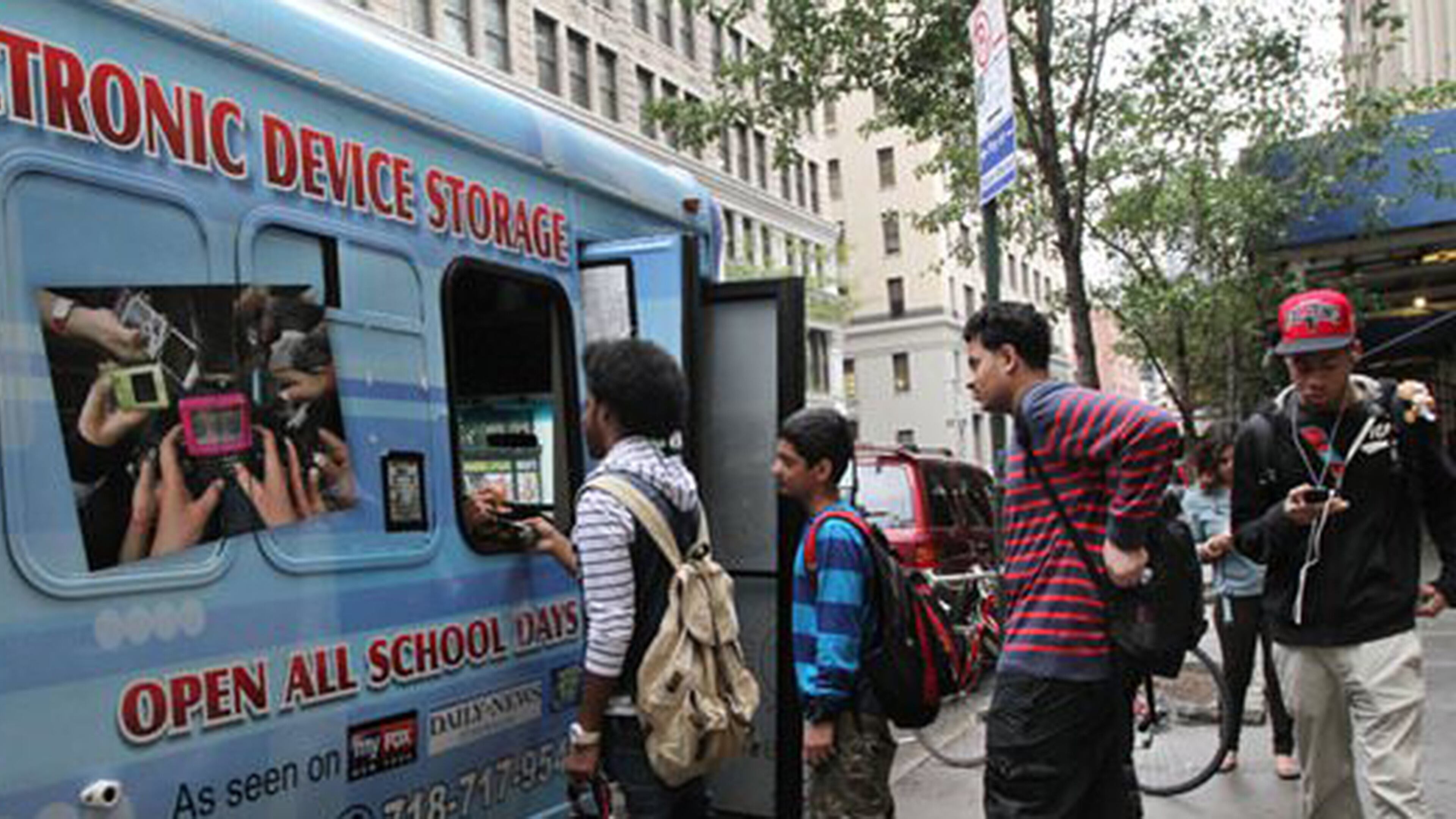 Before New York City lifted its ban on cell phones in schools this year, students paid to store them at mobile storage trucks parked near their schools.