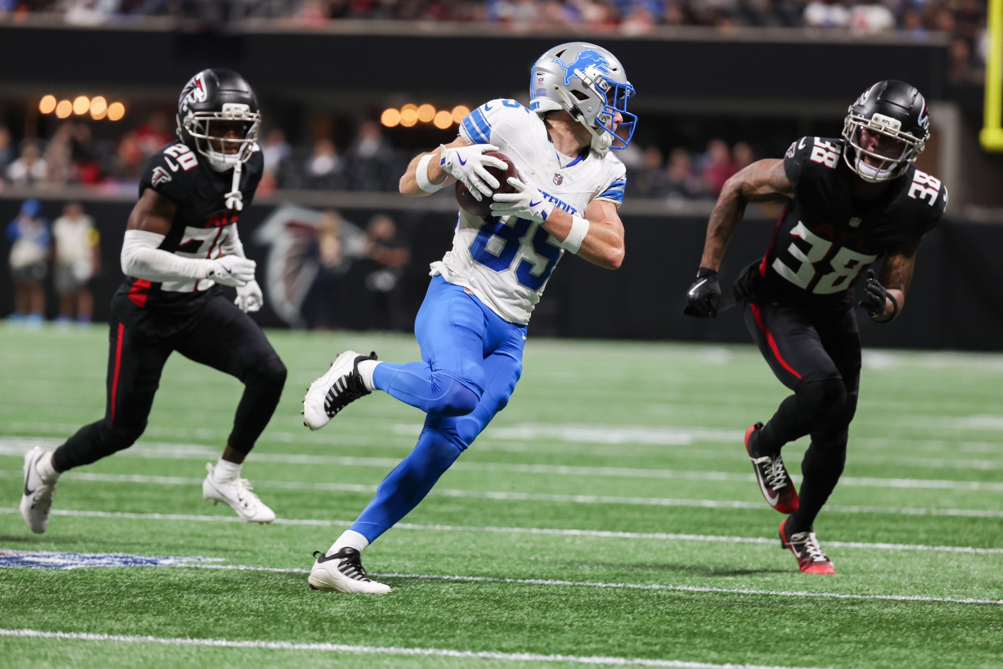 Atlanta Falcons cornerback Dee Alford (20) and Atlanta Falcons cornerback Lamar Jackson (38) put pressure on Detroit Lions wide receiver Tom Kennedy (85) during the first half of an NFL preseason game against the Detroit Lions at Mercedes-Benz Stadium in Atlanta on Friday, August 8, 2025. (Arvin Temkar / AJC)